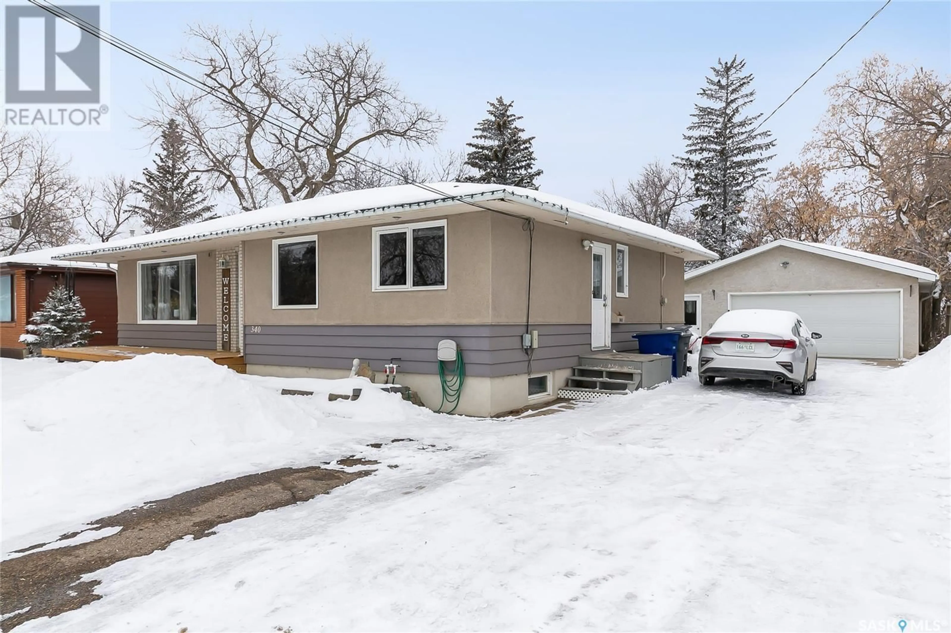 Home with vinyl exterior material, street for 340 Lake STREET, Lumsden Saskatchewan S0G3C0