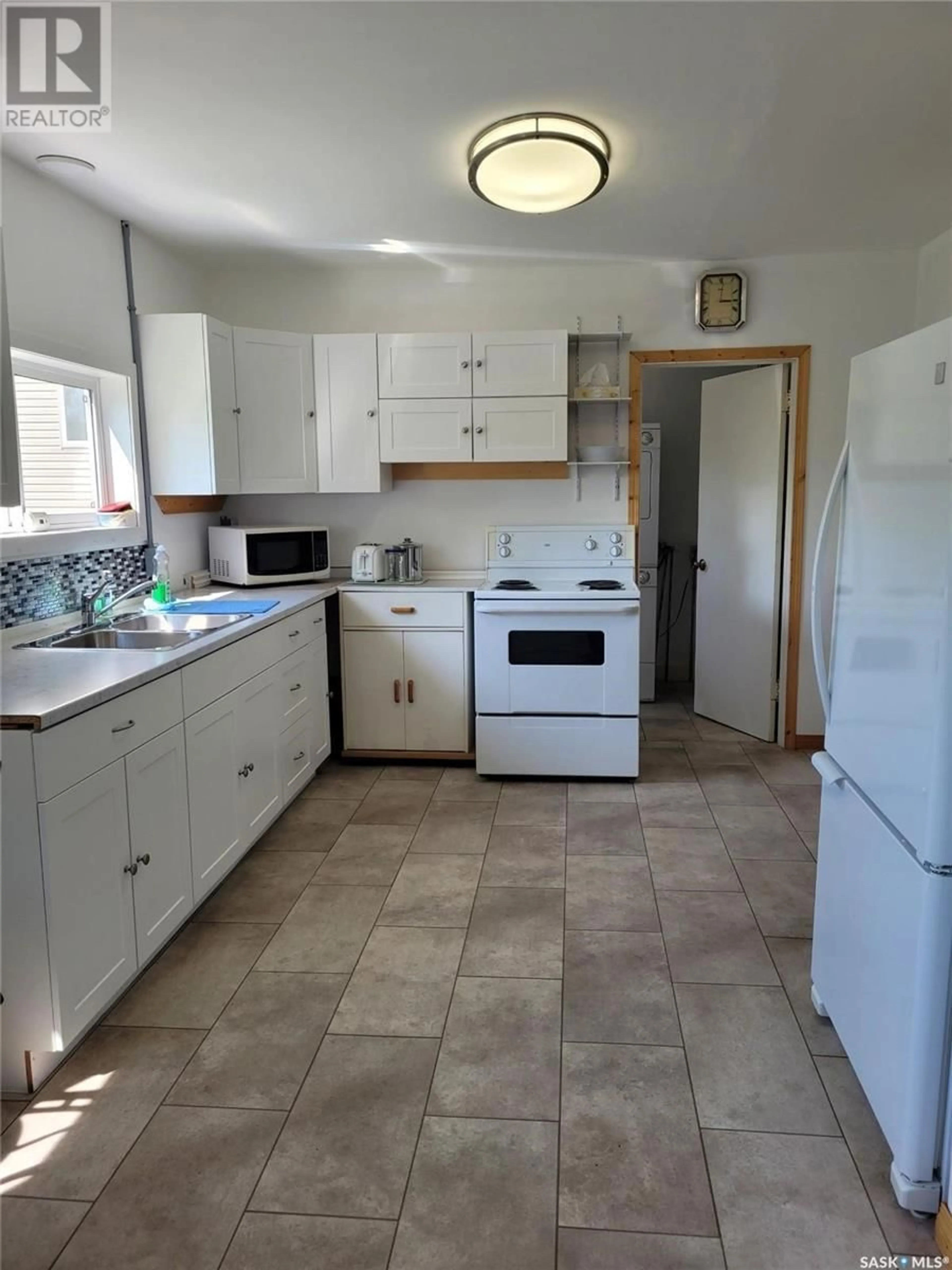 Standard kitchen, ceramic/tile floor for 211 3RD STREET, Meadow Lake Saskatchewan S9X1Y6