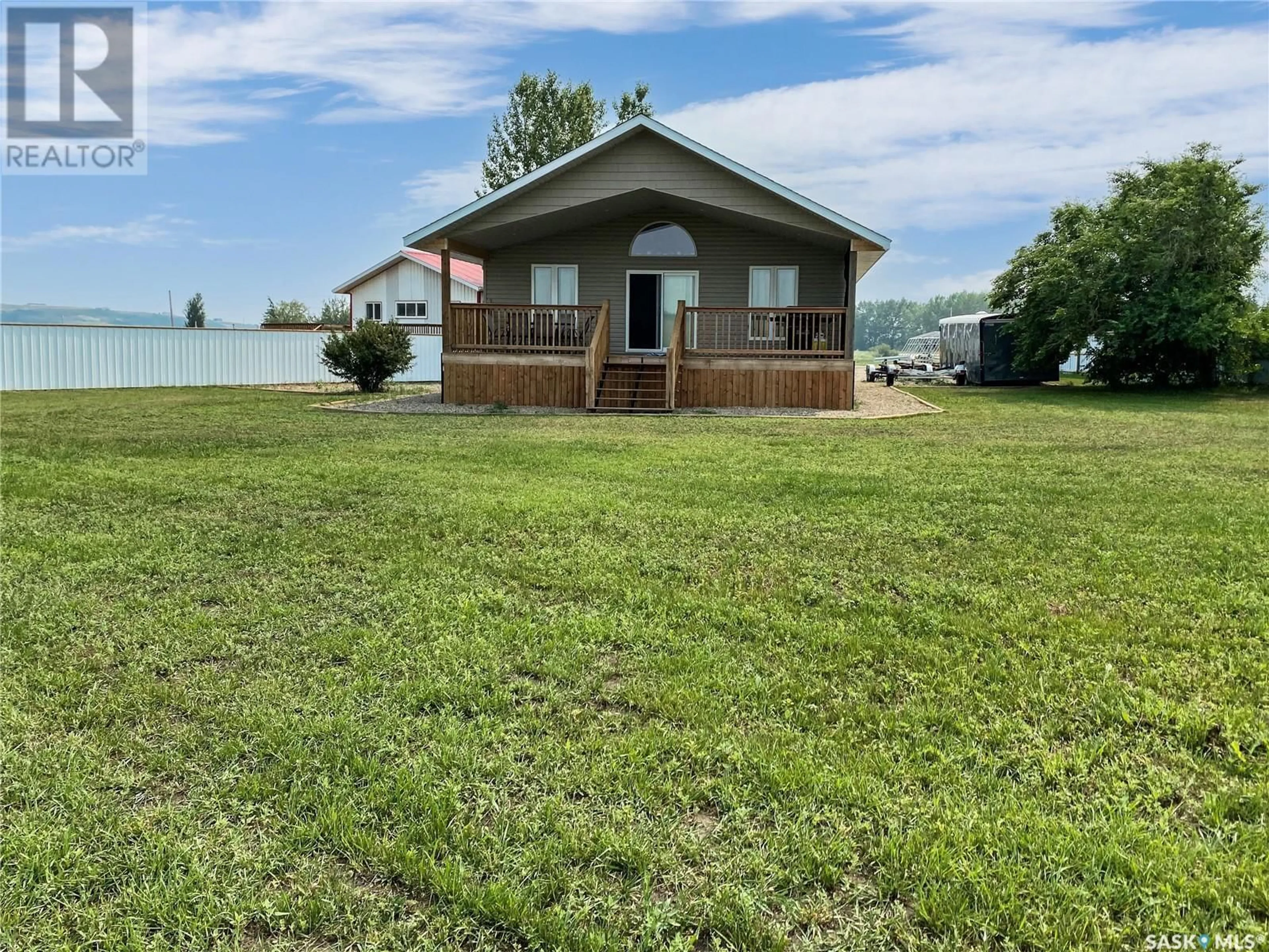 A pic from outside/outdoor area/front of a property/back of a property/a pic from drone, water/lake/river/ocean view for 140 McLennan DRIVE, Cochin Saskatchewan S0M0L0