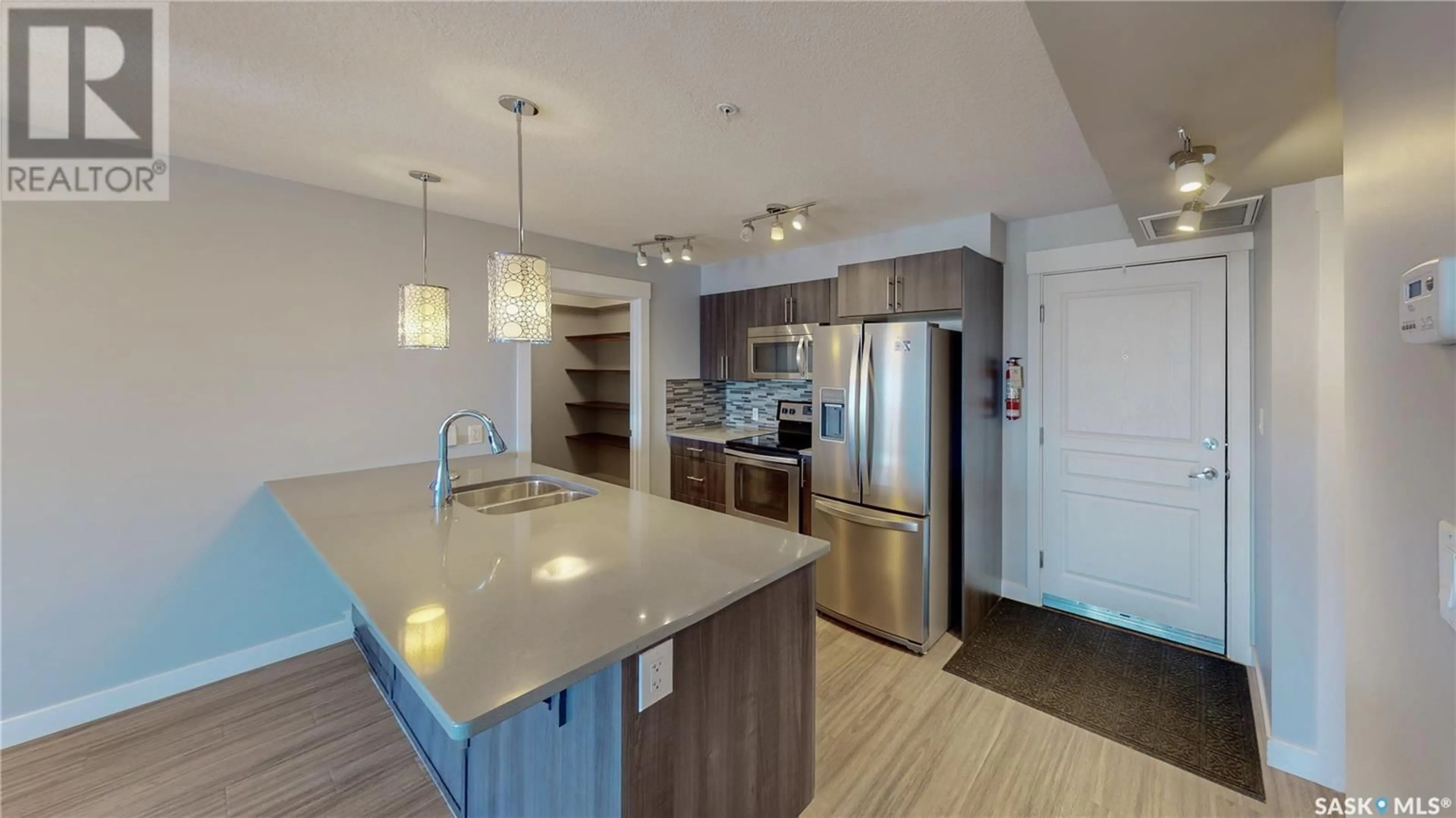 Open concept kitchen, unknown for 310 5301 Universal CRESCENT, Regina Saskatchewan S4W0L2