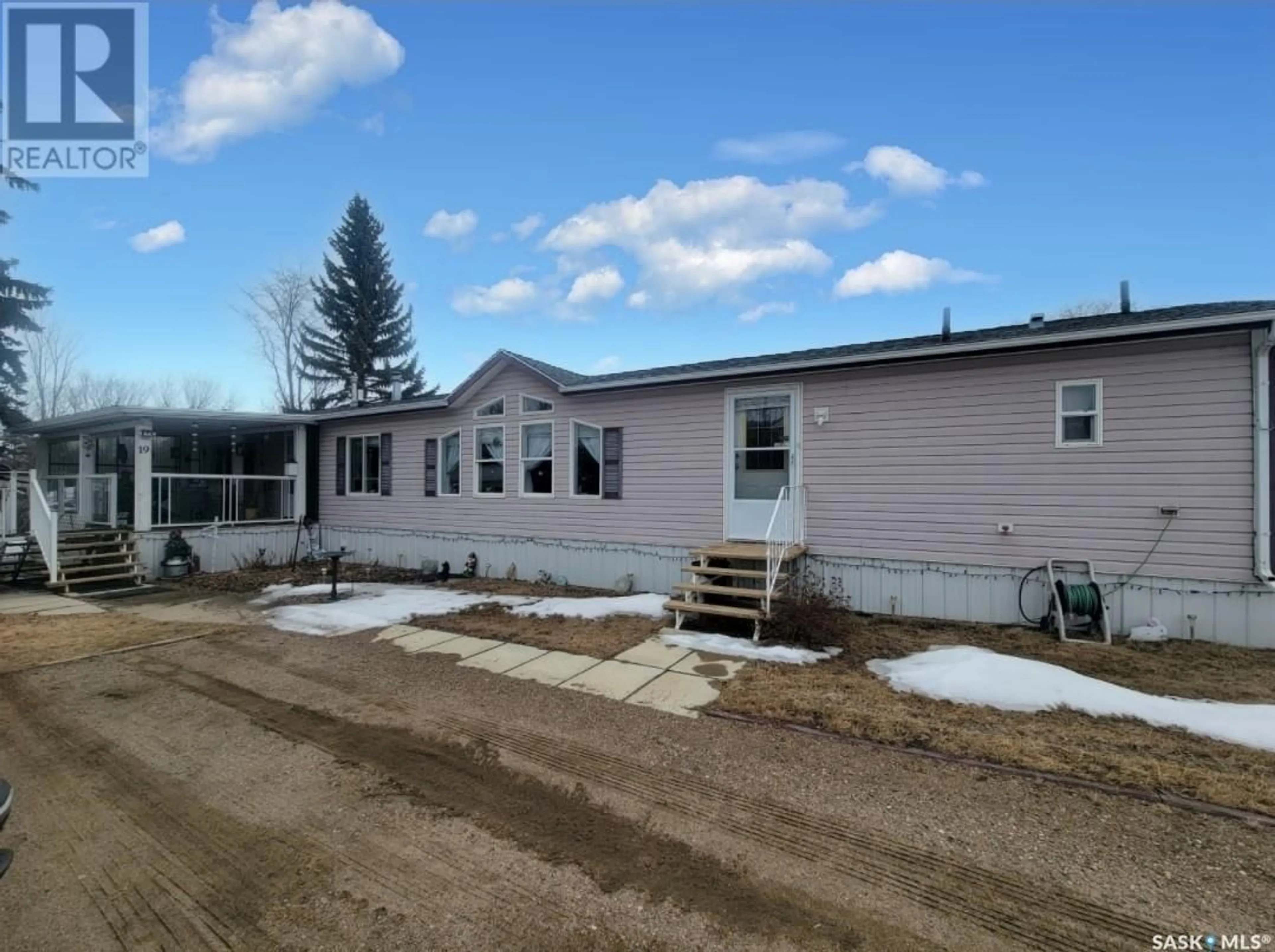 A pic from outside/outdoor area/front of a property/back of a property/a pic from drone, unknown for E - 19 600 5TH STREET, Unity Saskatchewan S0K4L0