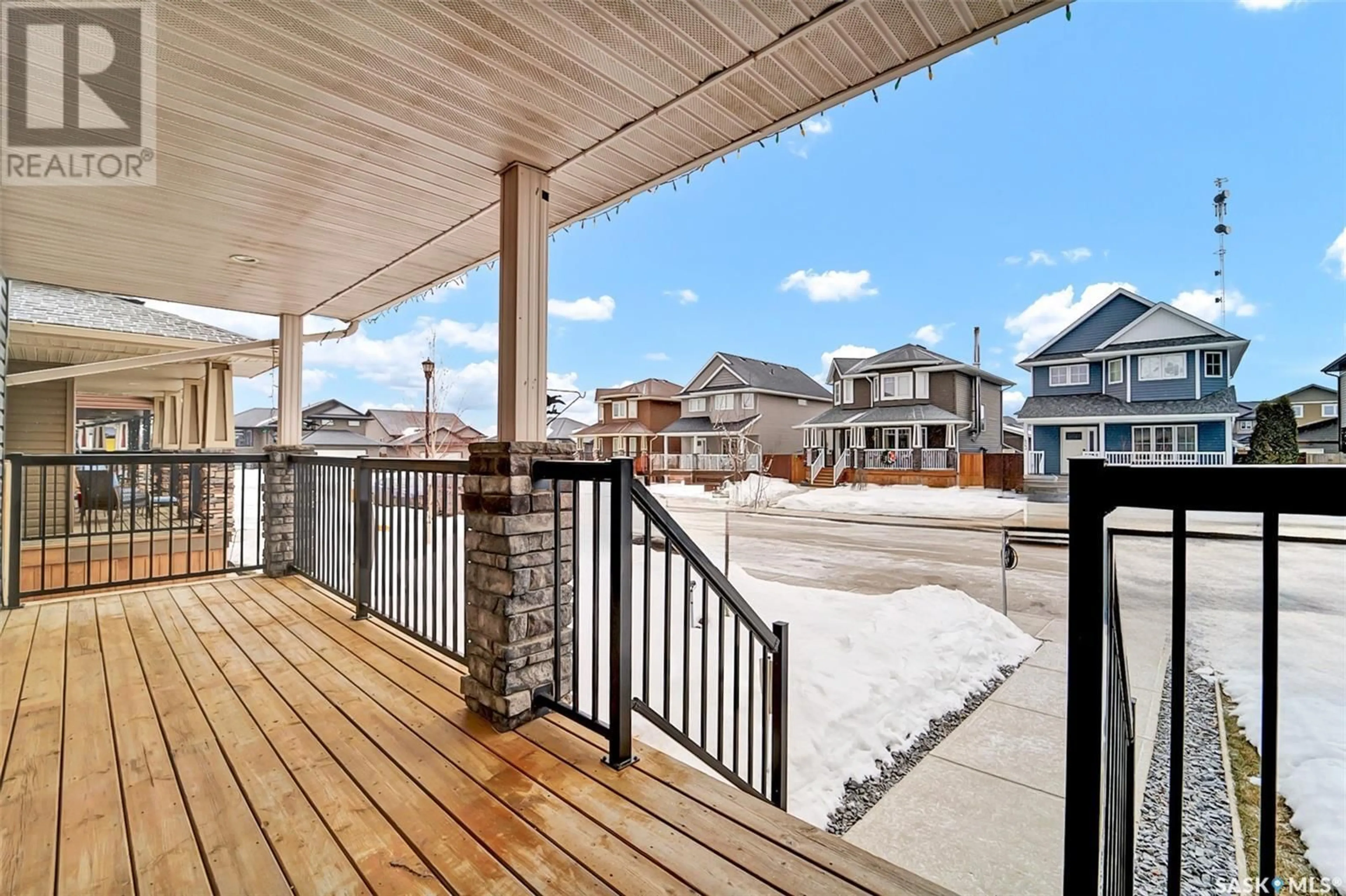 Patio, water/lake/river/ocean view for 424 Golden Willow WAY, Warman Saskatchewan S0K4S2