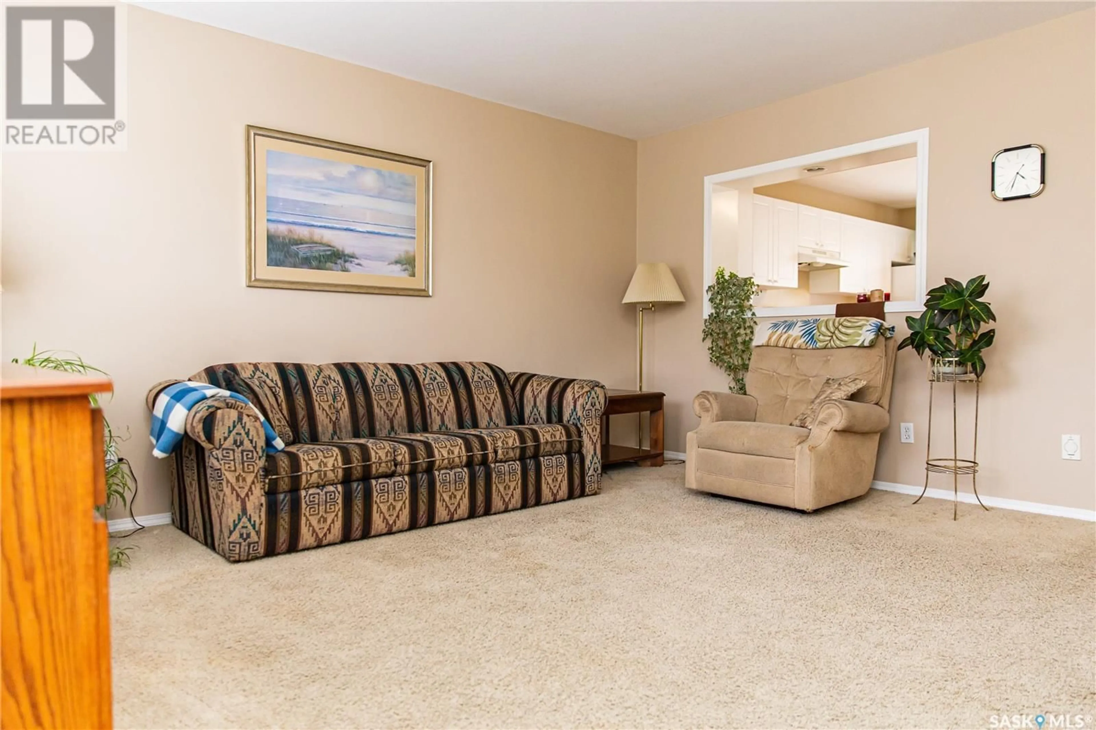 Living room with furniture, carpet floor for 135 663 Beckett CRESCENT, Saskatoon Saskatchewan S7N4W8