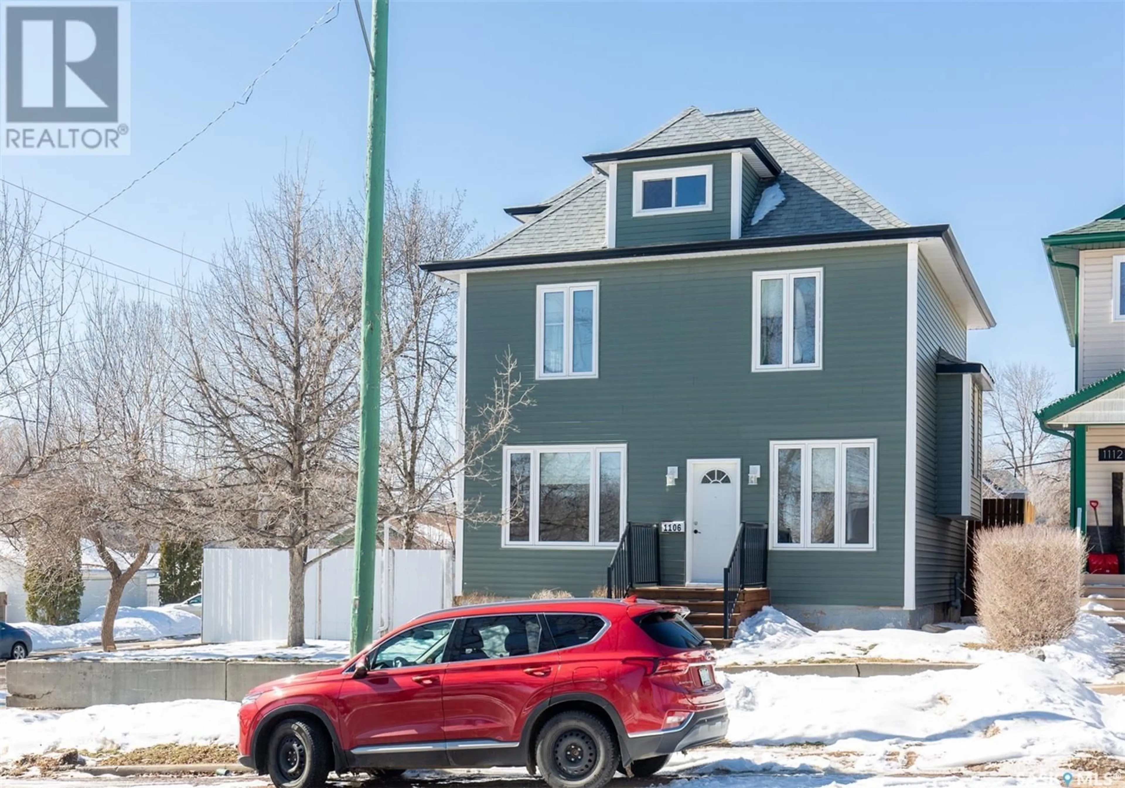 Home with vinyl exterior material, street for 1106 2nd AVENUE NE, Moose Jaw Saskatchewan S6H1C6