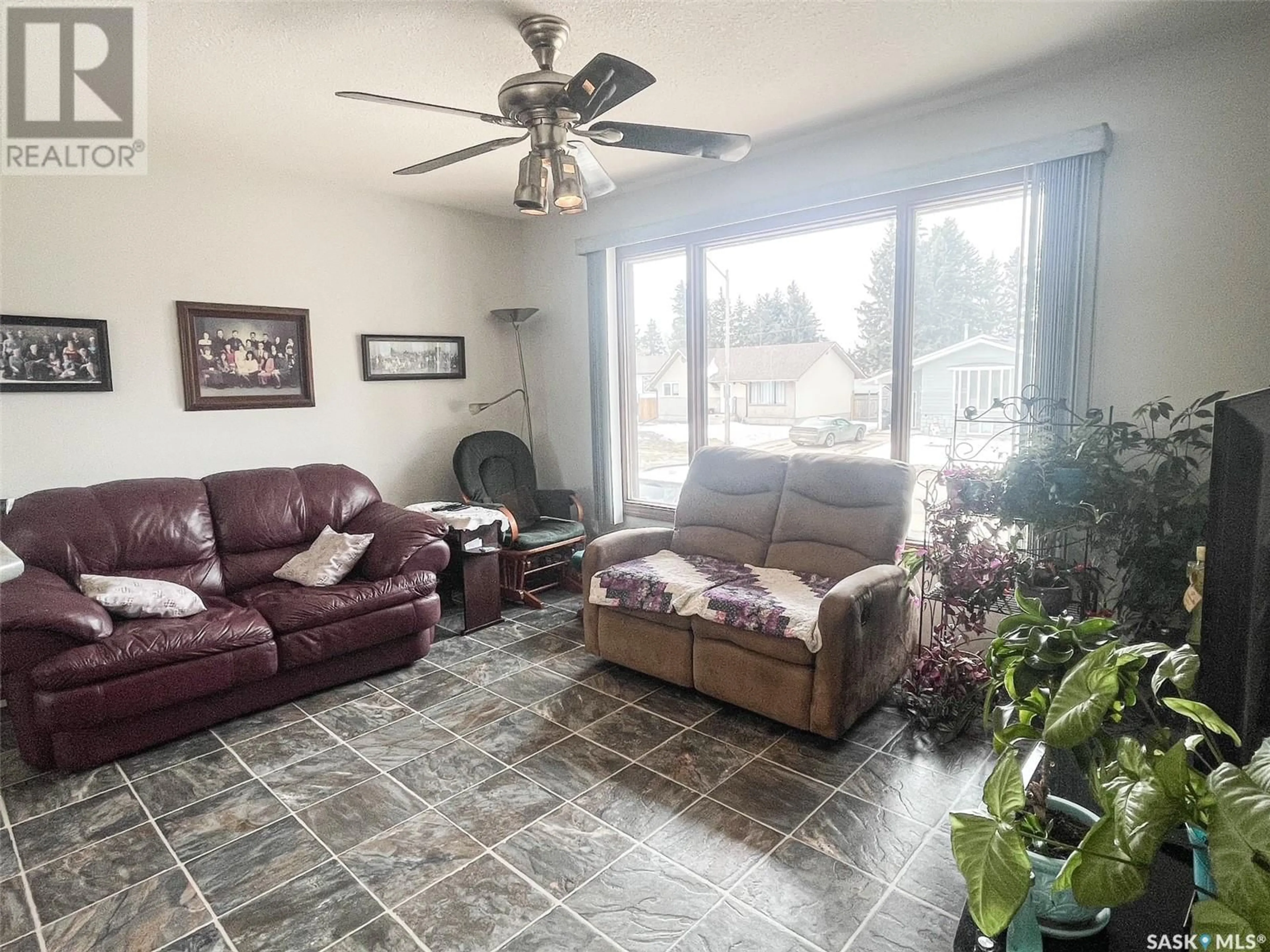 Living room with furniture, ceramic/tile floor for 608 2nd STREET W, Meadow Lake Saskatchewan S9X1E1