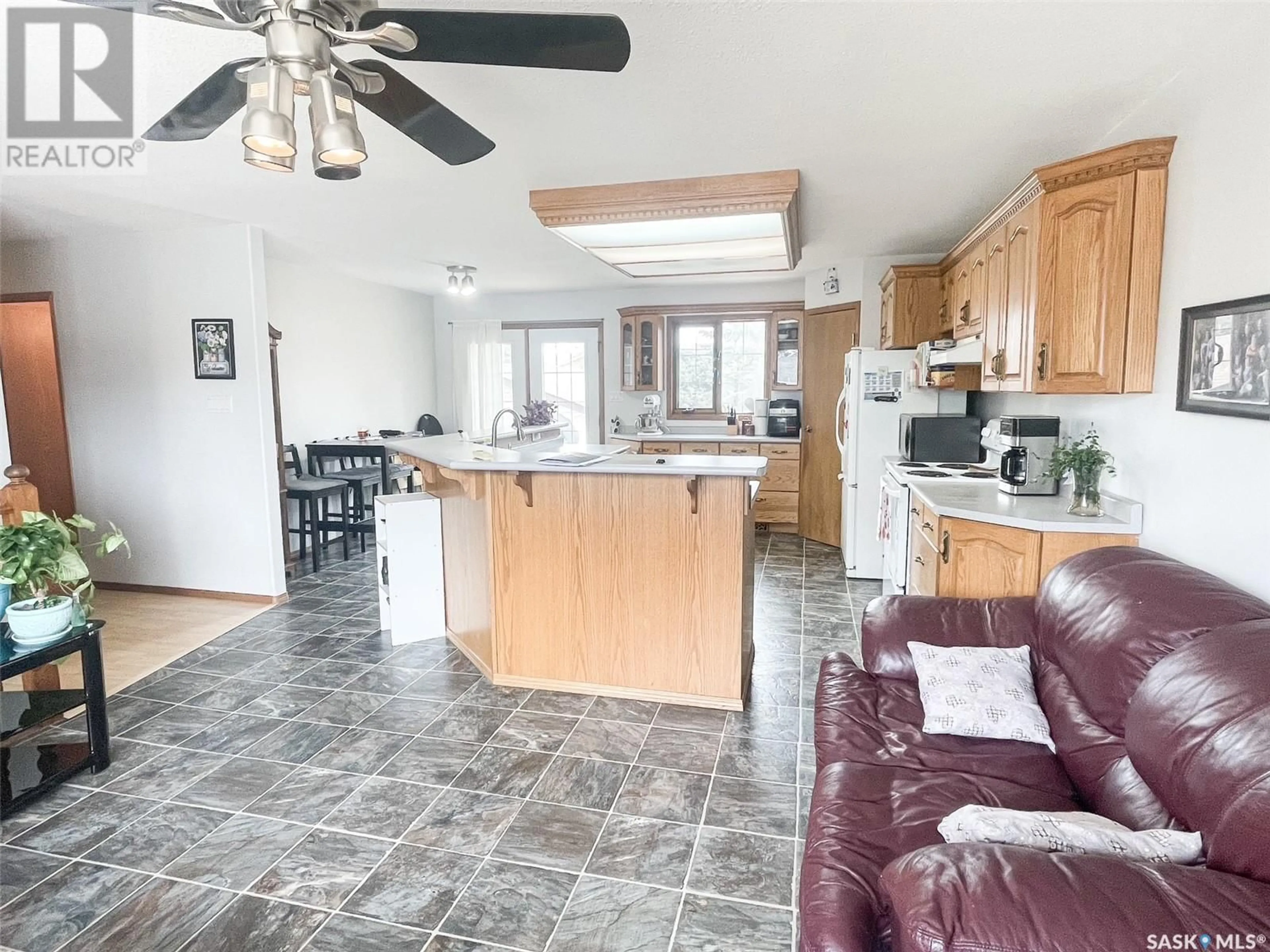 Open concept kitchen, ceramic/tile floor for 608 2nd STREET W, Meadow Lake Saskatchewan S9X1E1