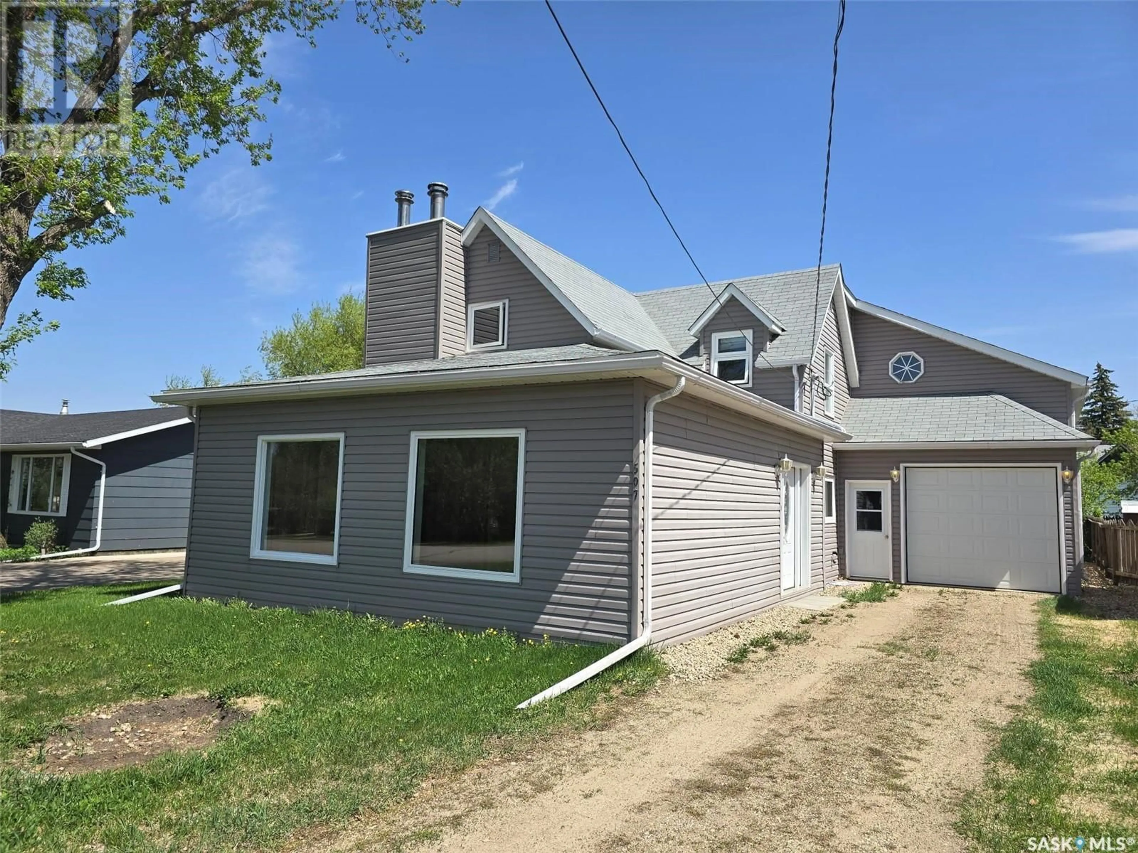 Home with vinyl exterior material, street for 507 PHEASANT STREET, Grenfell Saskatchewan S0G2B0