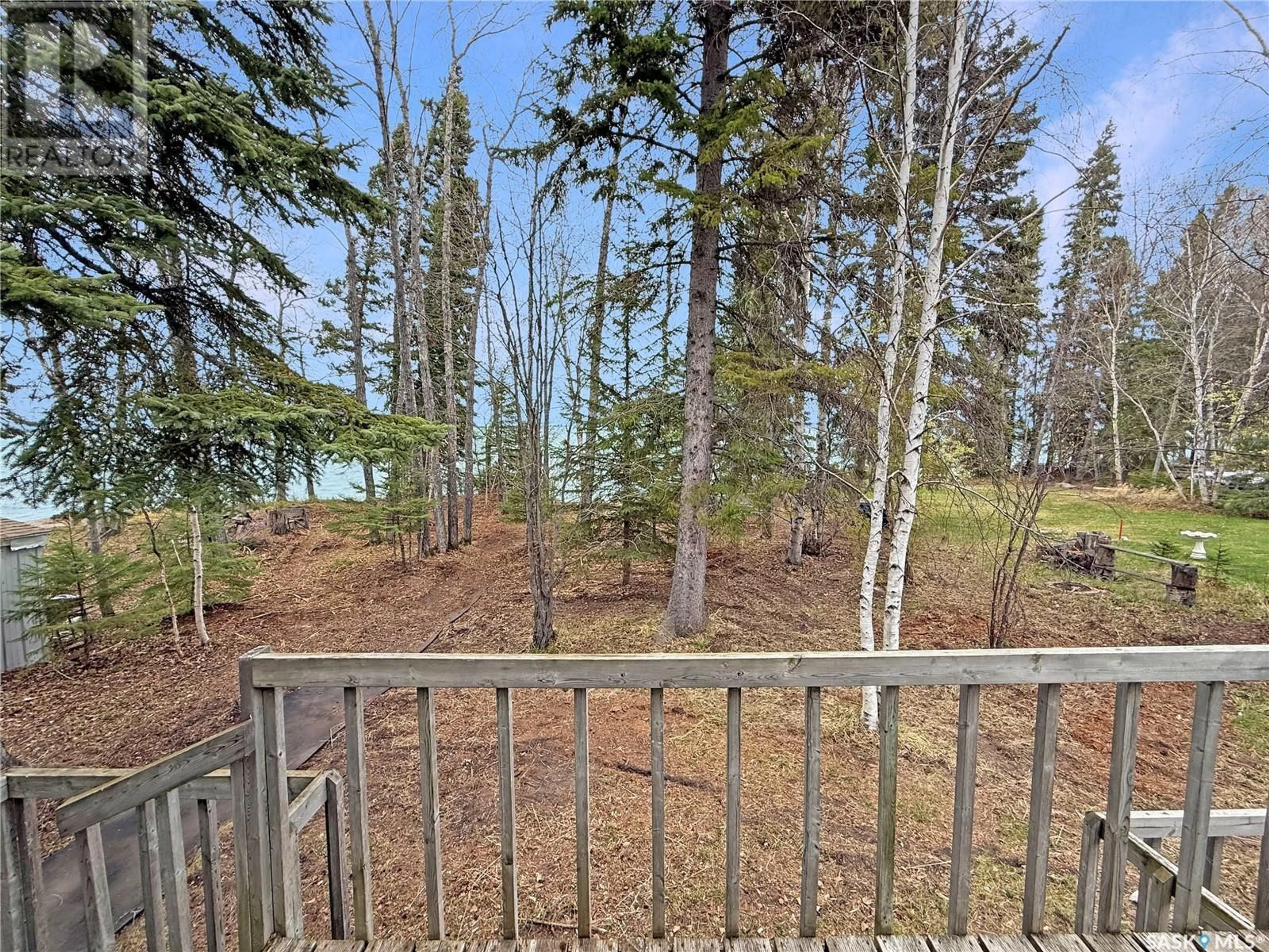 A pic from outside/outdoor area/front of a property/back of a property/a pic from drone, forest/trees view for 8 BESKAL PLACE, Candle Lake Saskatchewan S0J3E0