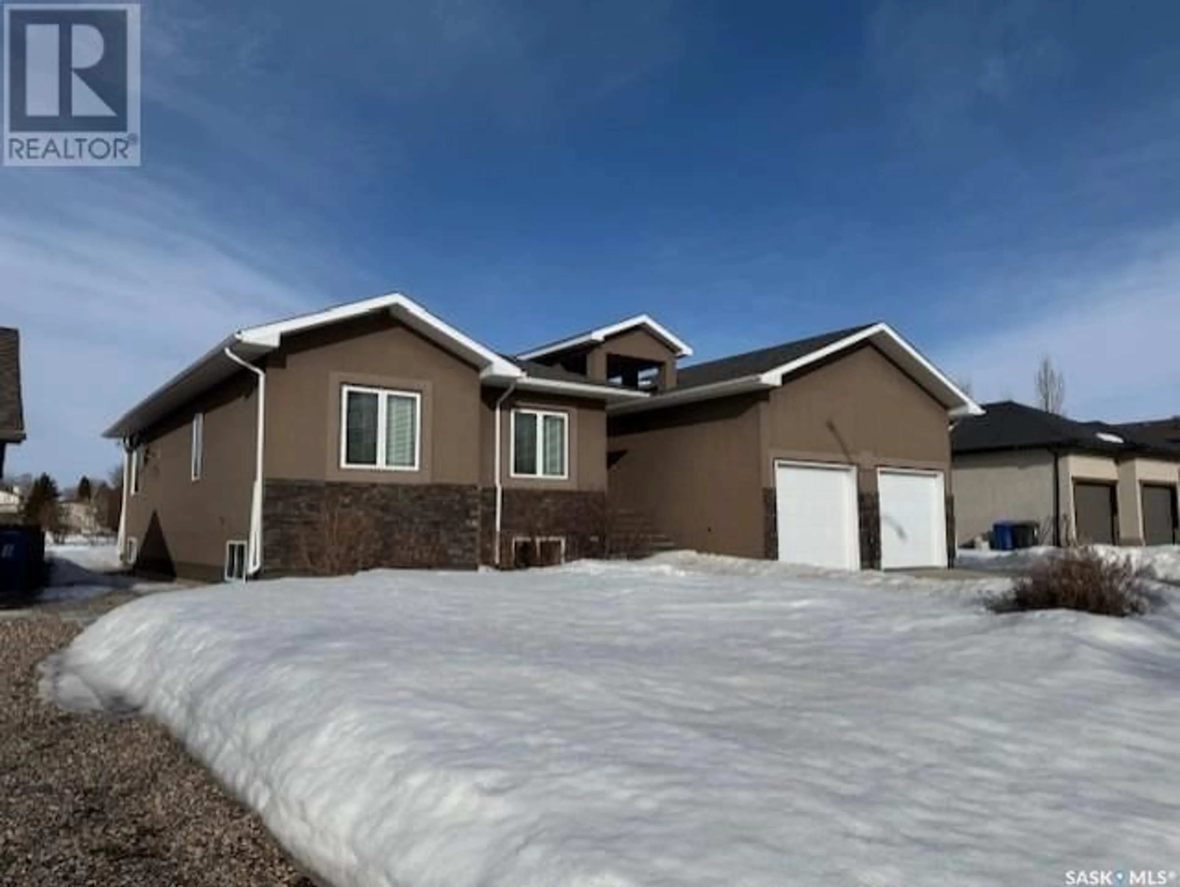 Home with vinyl exterior material, street for 9 PARK BOULEVARD, Melville Saskatchewan S0A2P0