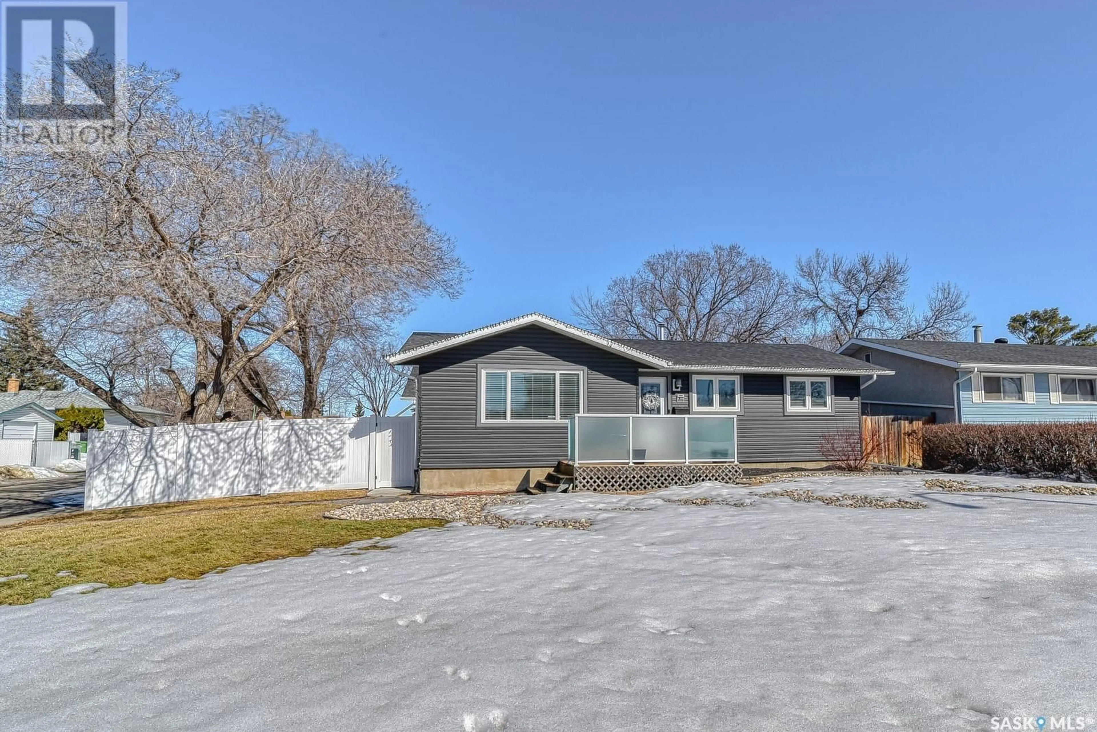 A pic from outside/outdoor area/front of a property/back of a property/a pic from drone, street for 130 UPLAND DRIVE, Regina Saskatchewan S4R0C3