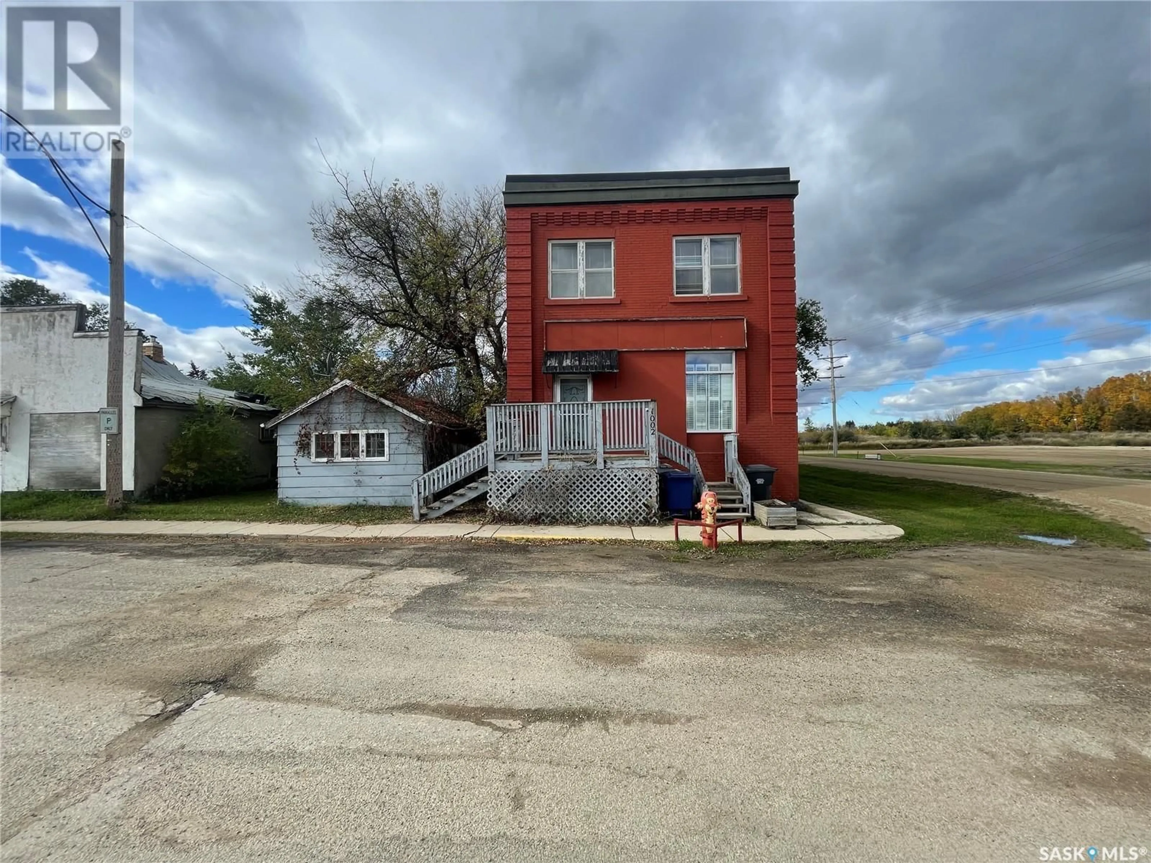 A pic from outside/outdoor area/front of a property/back of a property/a pic from drone, building for 1002 9TH STREET, Perdue Saskatchewan S0K3C0