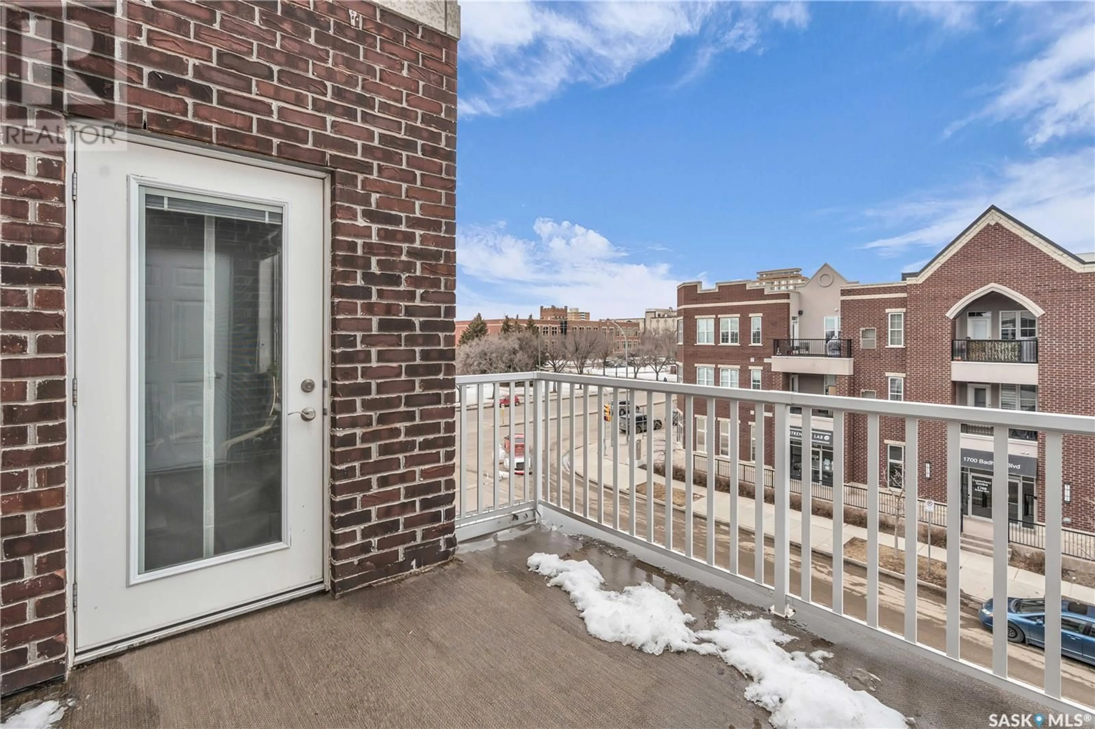 Balcony in the apartment, city buildings view from balcony for 301 1715 BADHAM BOULEVARD, Regina Saskatchewan S4P0L9