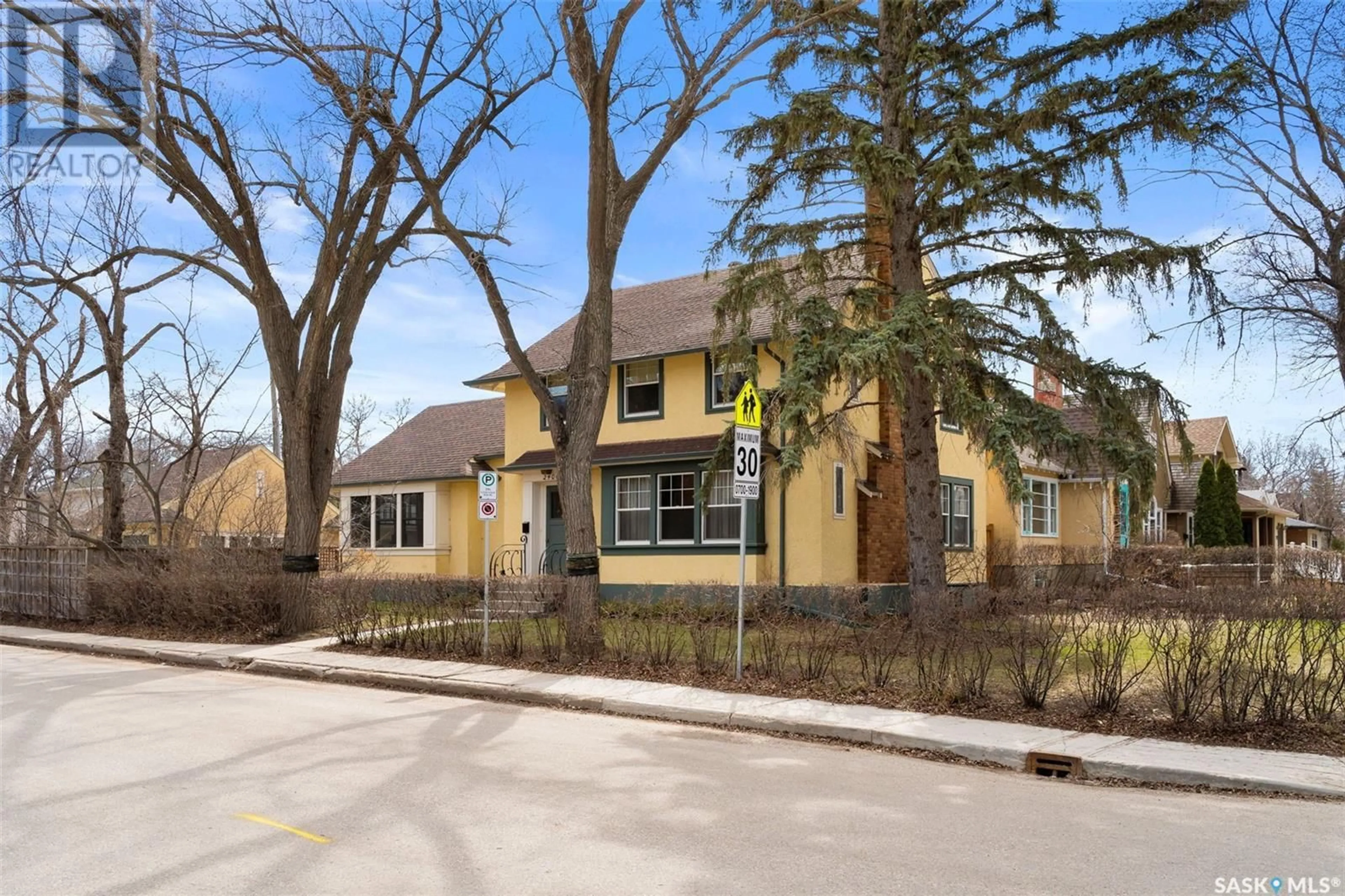 Home with brick exterior material, street for 2400 RETALLACK STREET, Regina Saskatchewan S4T2L1