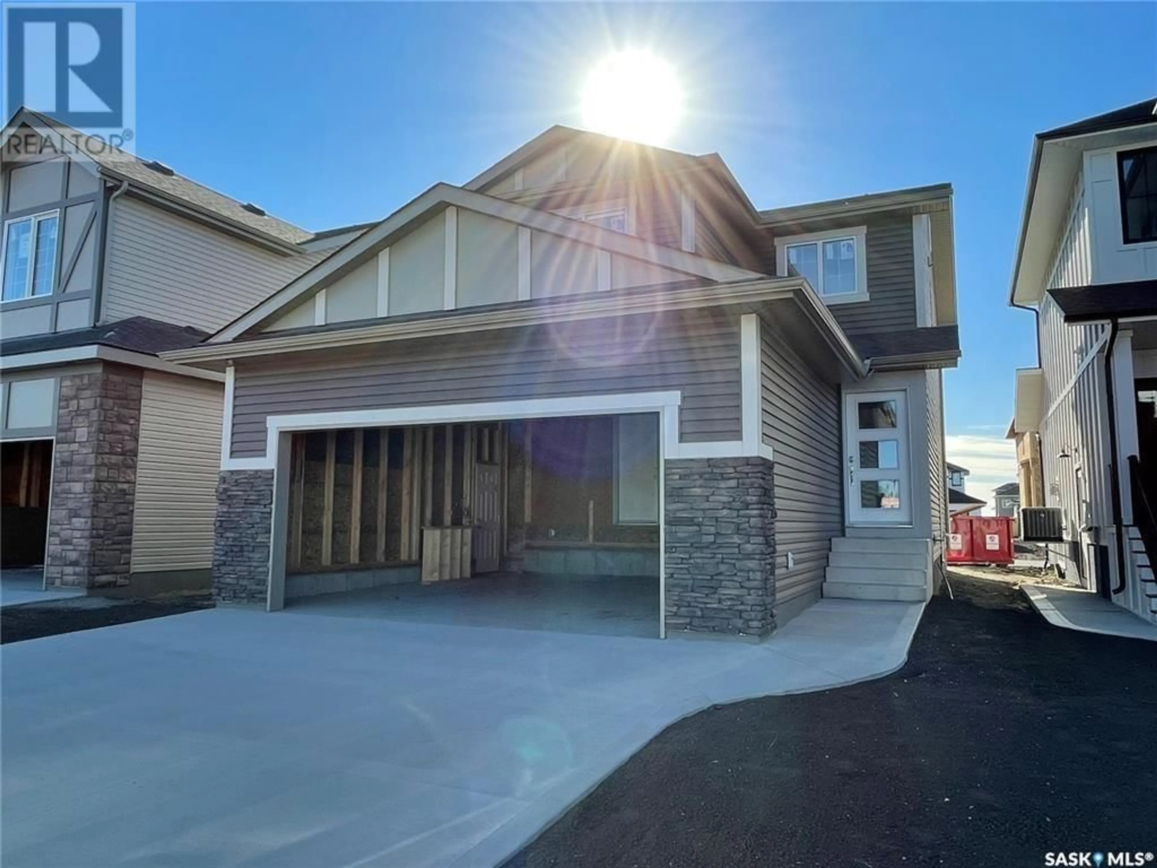 Home with vinyl exterior material, street for 467 DORAN CRESCENT, Saskatoon Saskatchewan S7V1W2