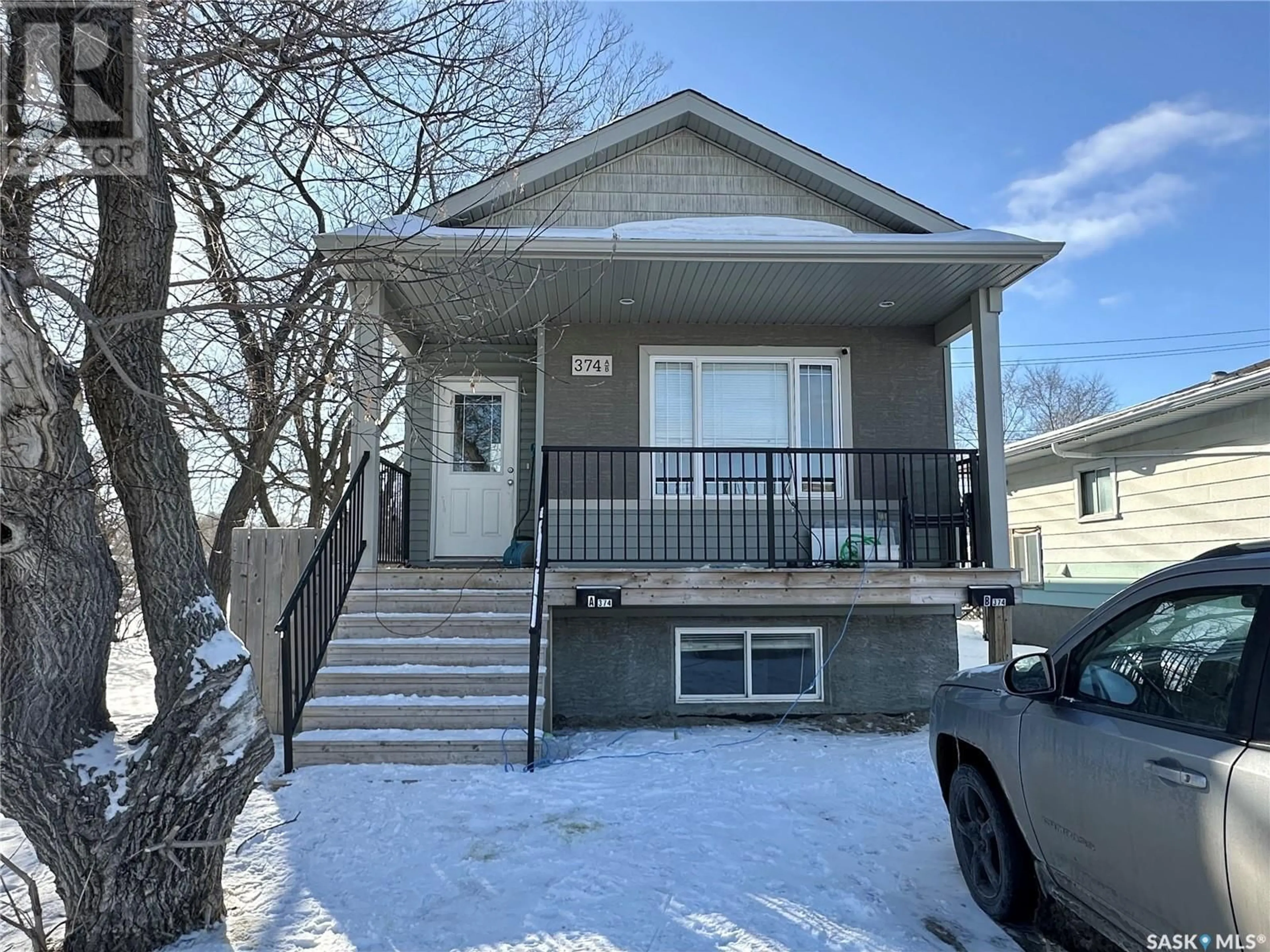 Home with vinyl exterior material, street for 374 WASCANA STREET, Regina Saskatchewan S4R4H9