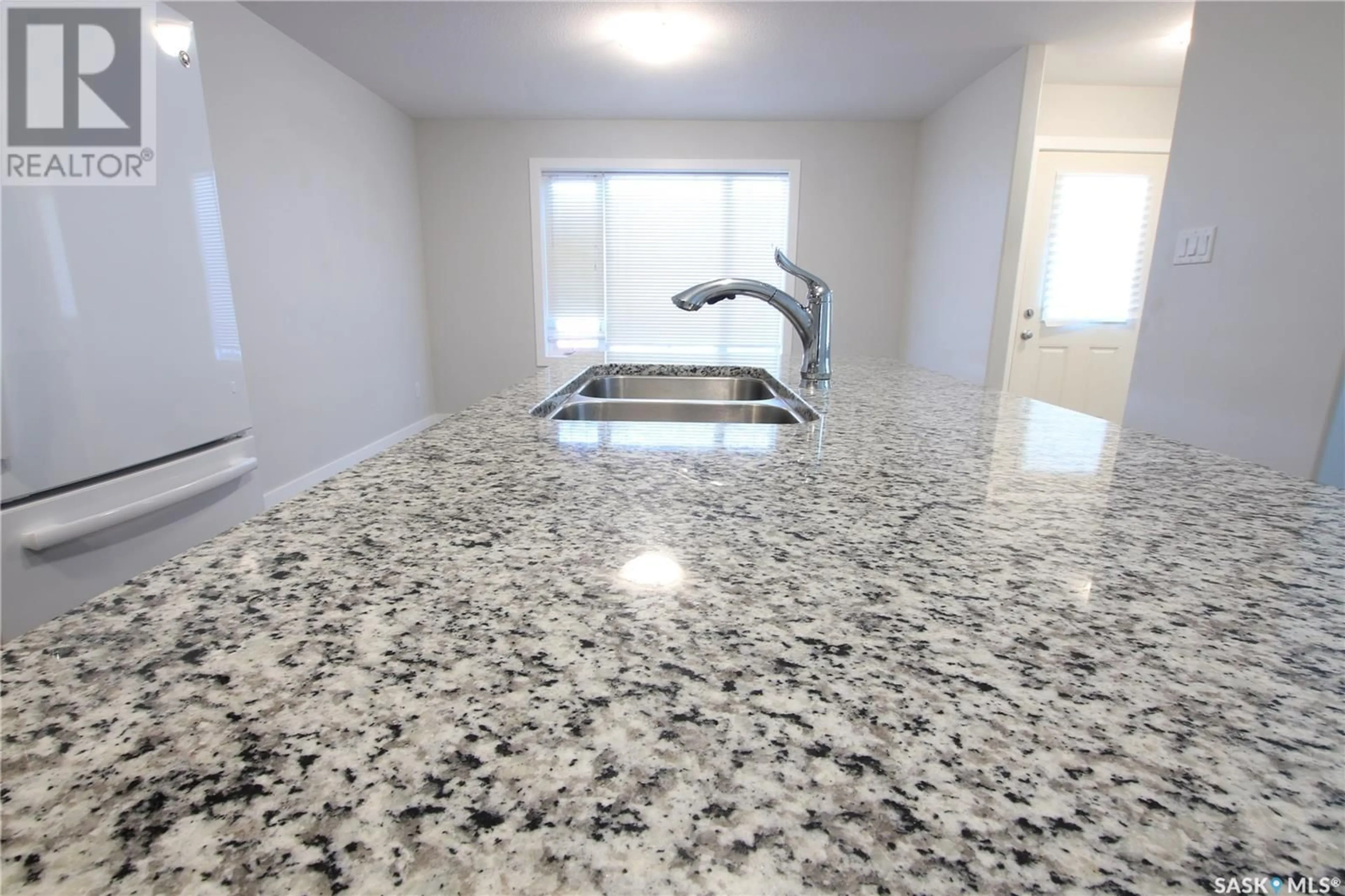 Standard kitchen, wood/laminate floor for 374 WASCANA STREET, Regina Saskatchewan S4R4H9