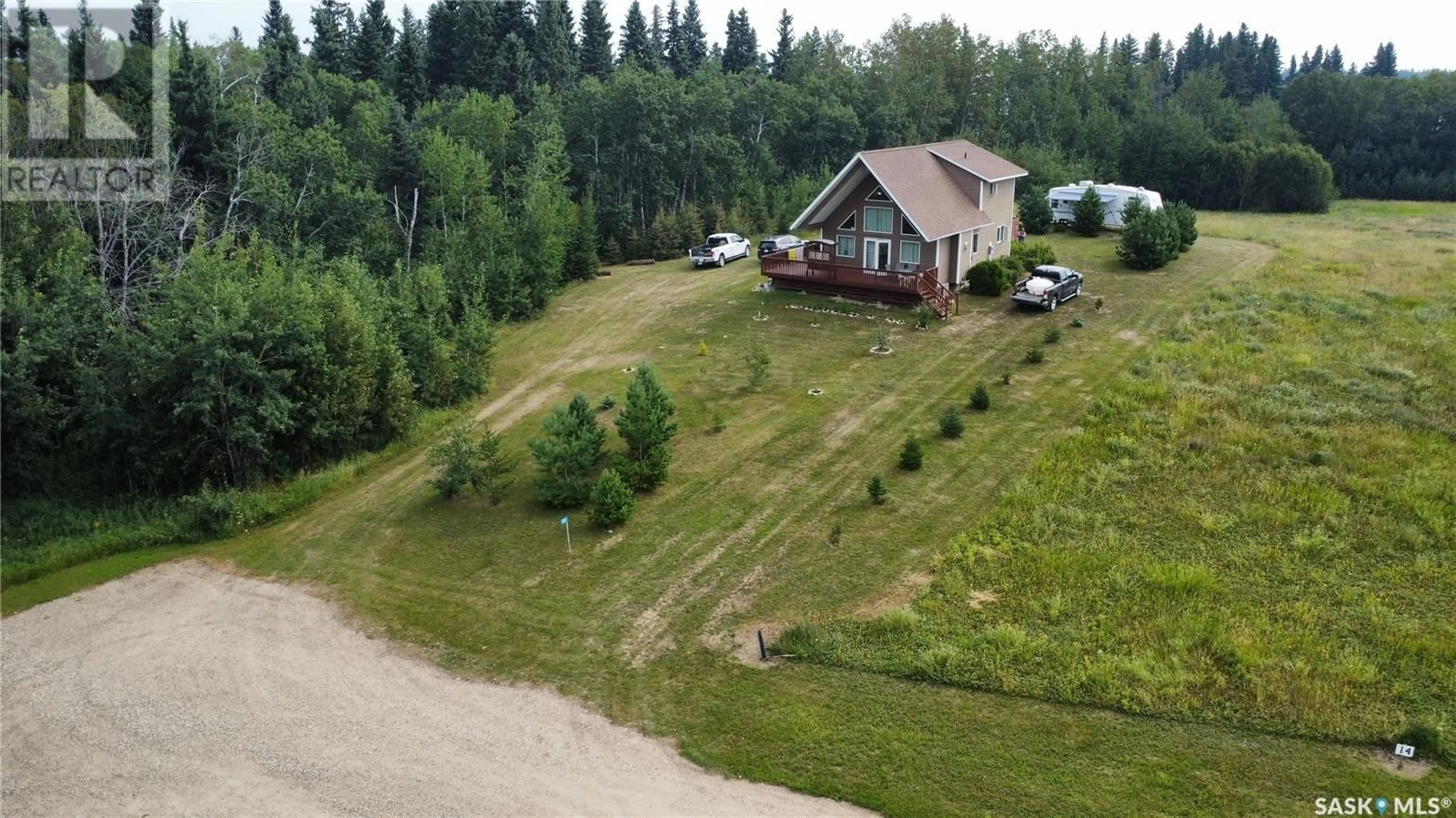 A pic from outside/outdoor area/front of a property/back of a property/a pic from drone, unknown for 13 JADE LANE, Shell Lake Saskatchewan S0J2G0