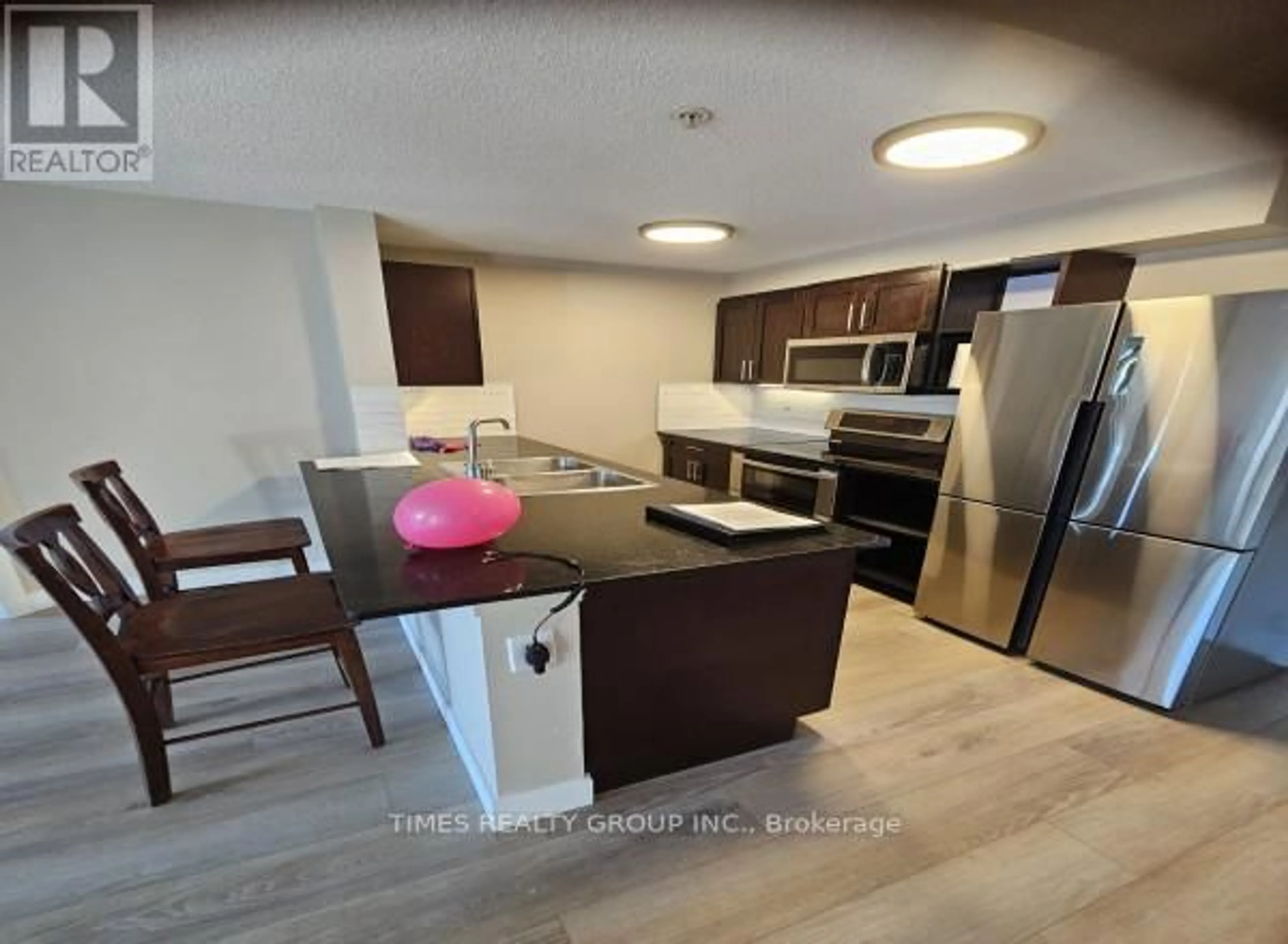 Contemporary kitchen for 1405 - 403 MACKENZIE WAY SW, Airdrie Alberta T4B3V7