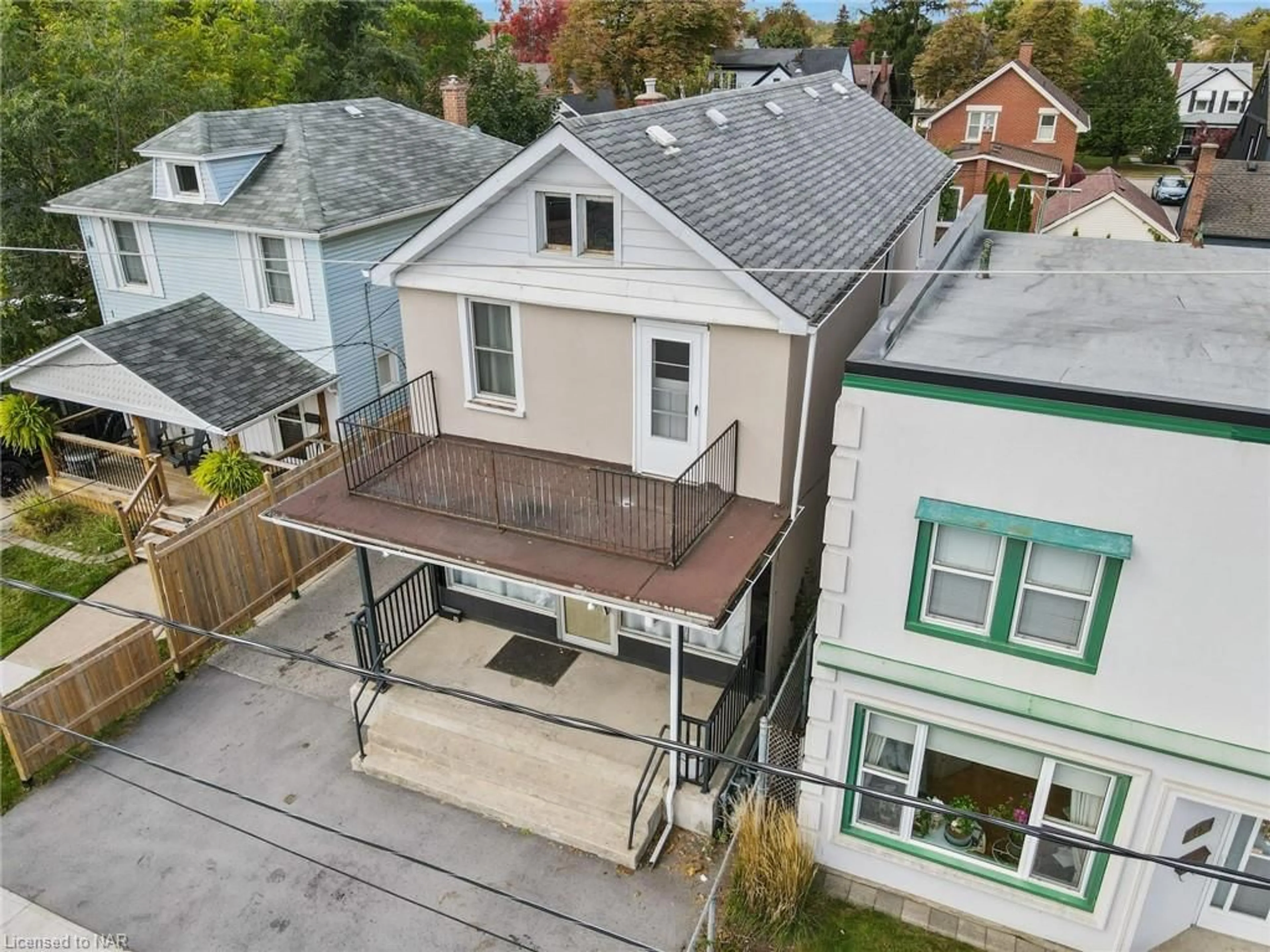 Frontside or backside of a home, the fenced backyard for 55 Chapel St, Thorold Ontario L2V 2C7