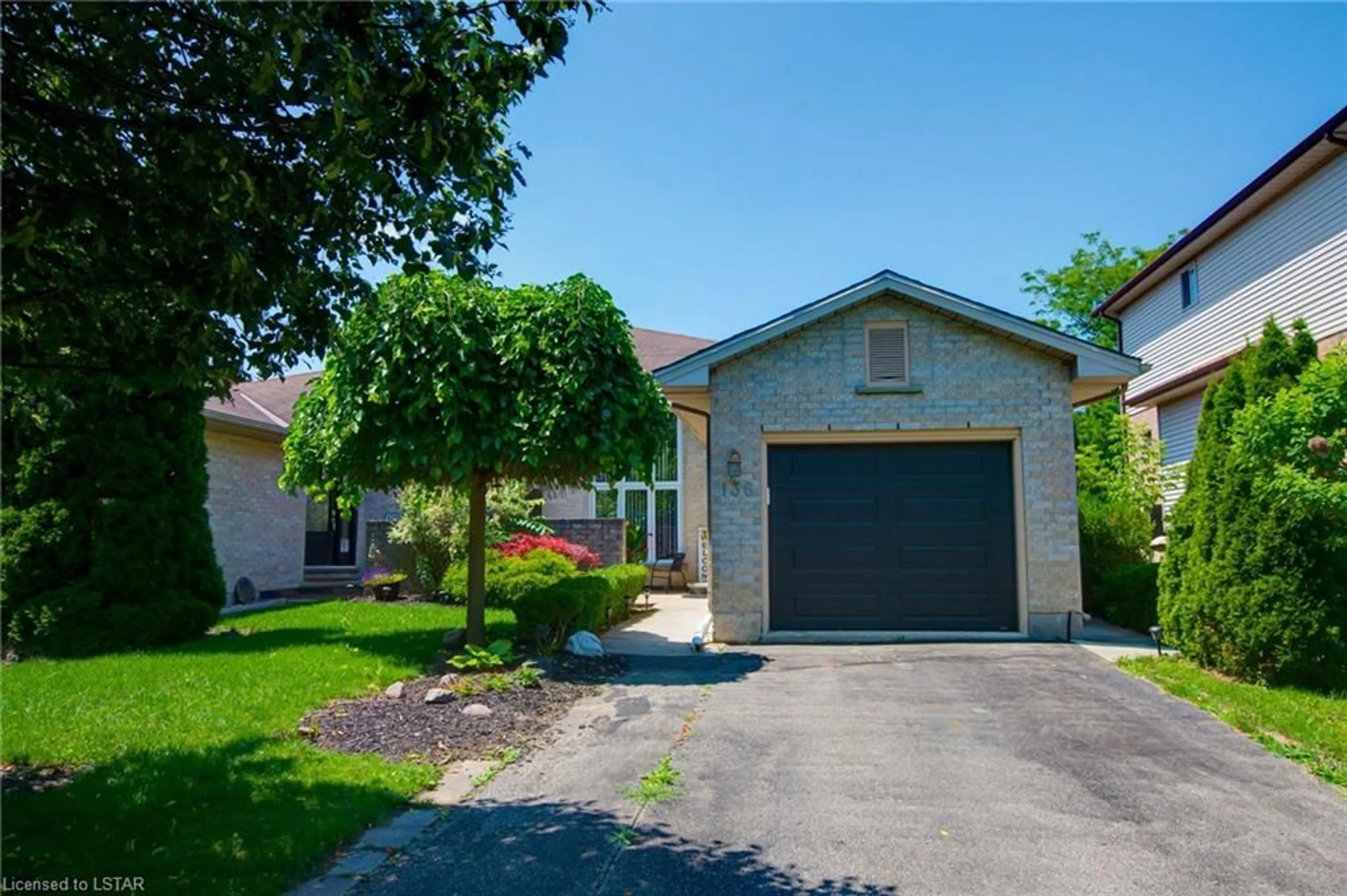 Frontside or backside of a home for 136 Cobblestone St, London Ontario N5Y 5N2