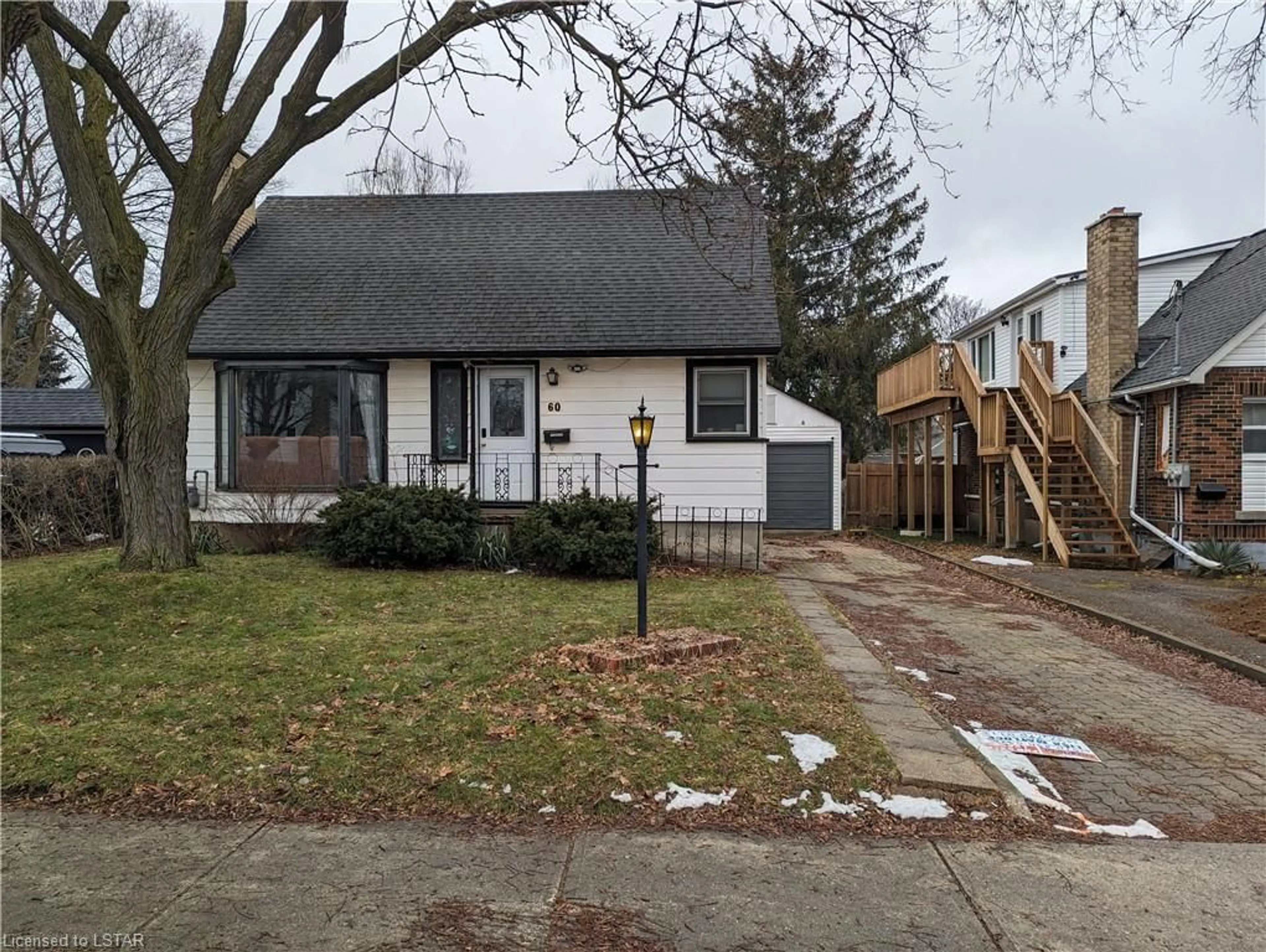 Frontside or backside of a home for 60 Eastman Ave, London Ontario N5W 2M4