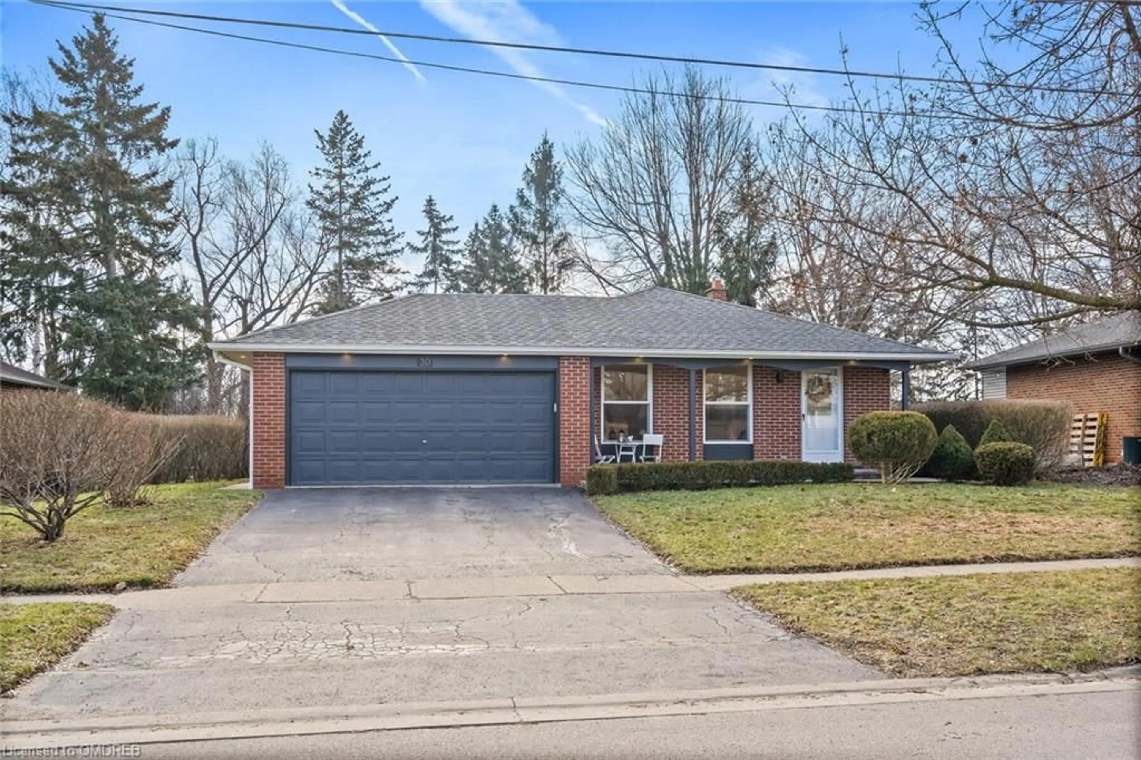 Home with brick exterior material for 30 Regan Cres, Georgetown Ontario L7G 1B1