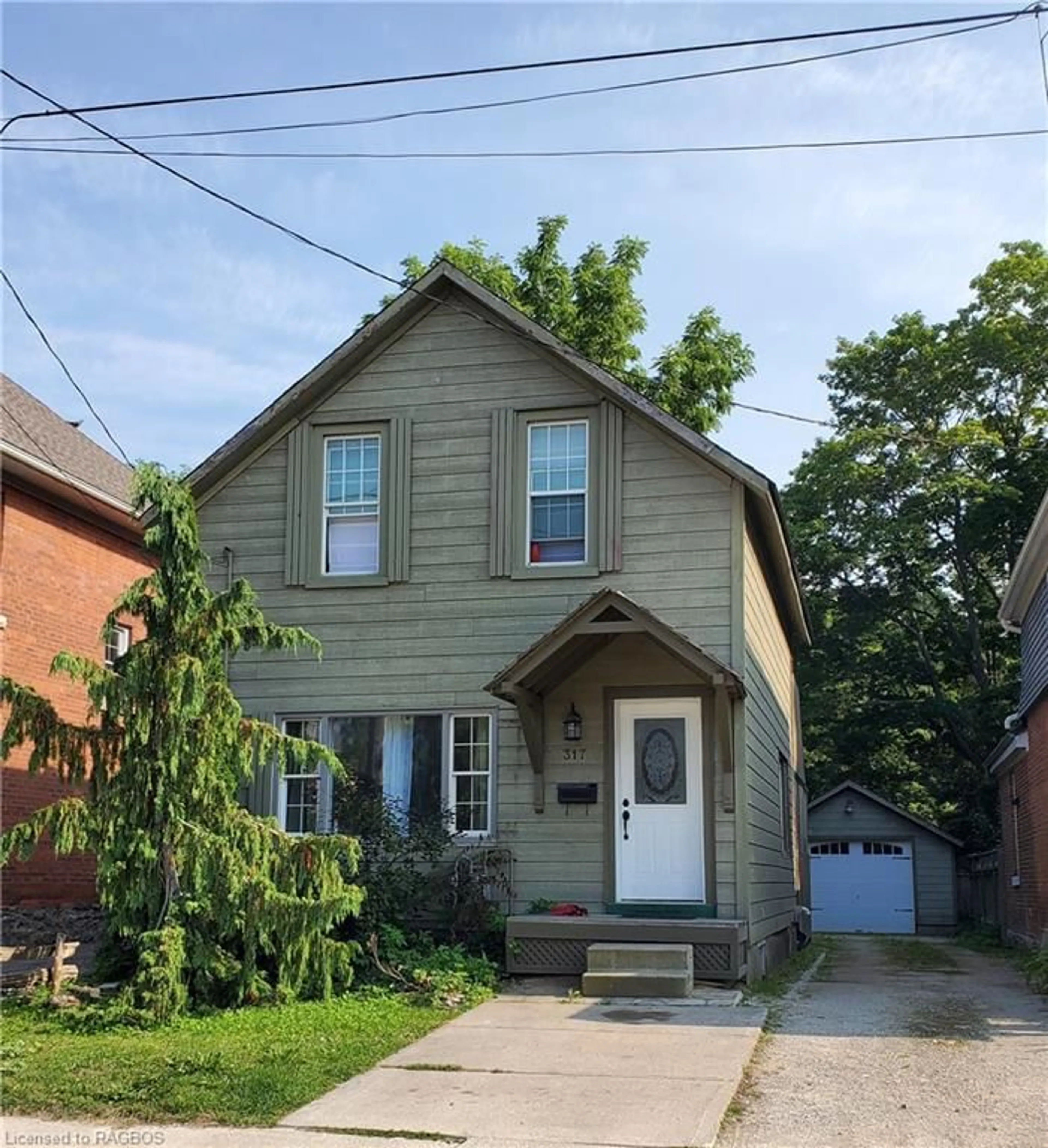 Frontside or backside of a home for 317 6th St, Owen Sound Ontario N4K 1G1