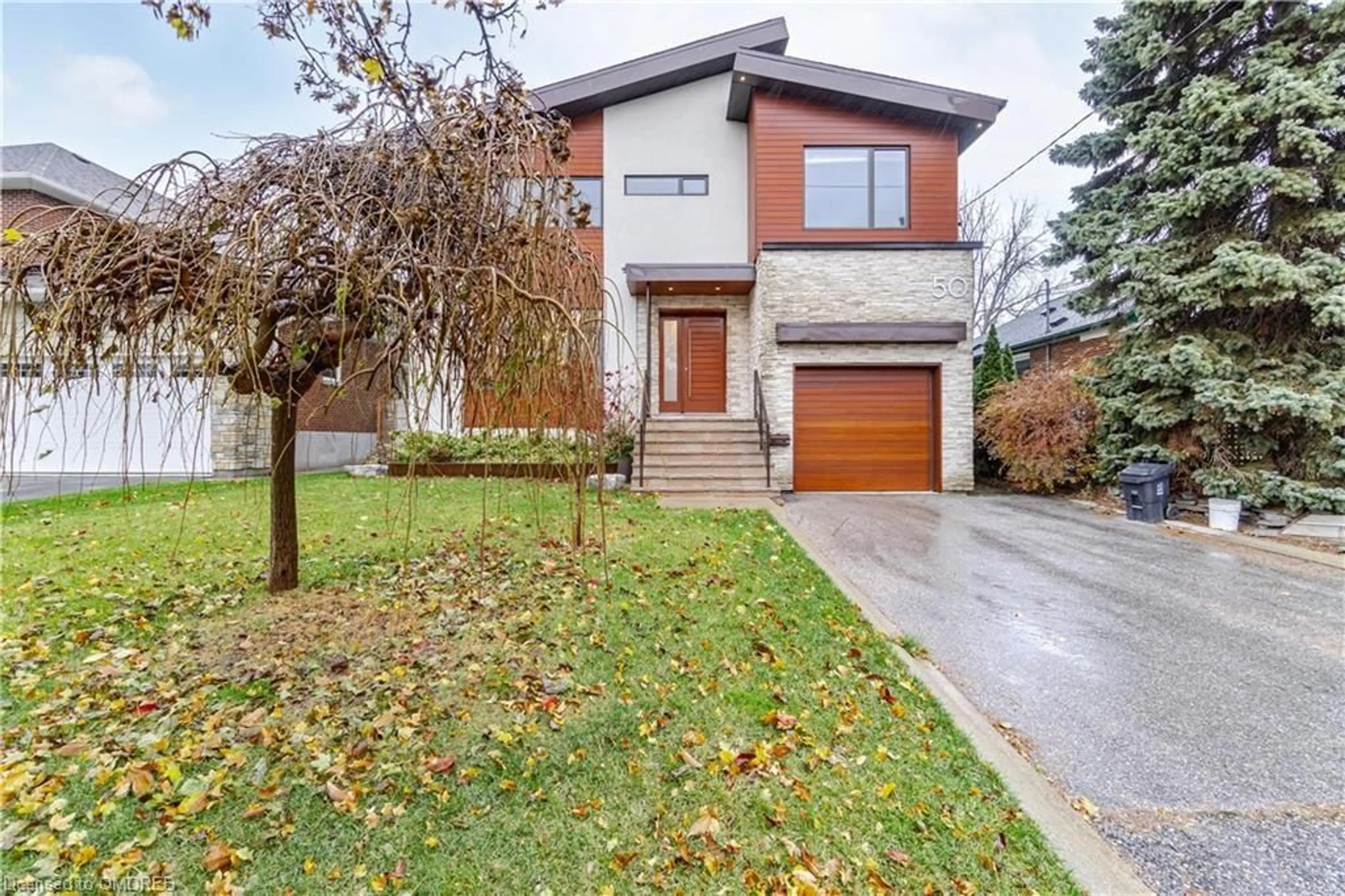 Home with brick exterior material for 50 Greenfield Dr, Toronto Ontario M9B 1H3