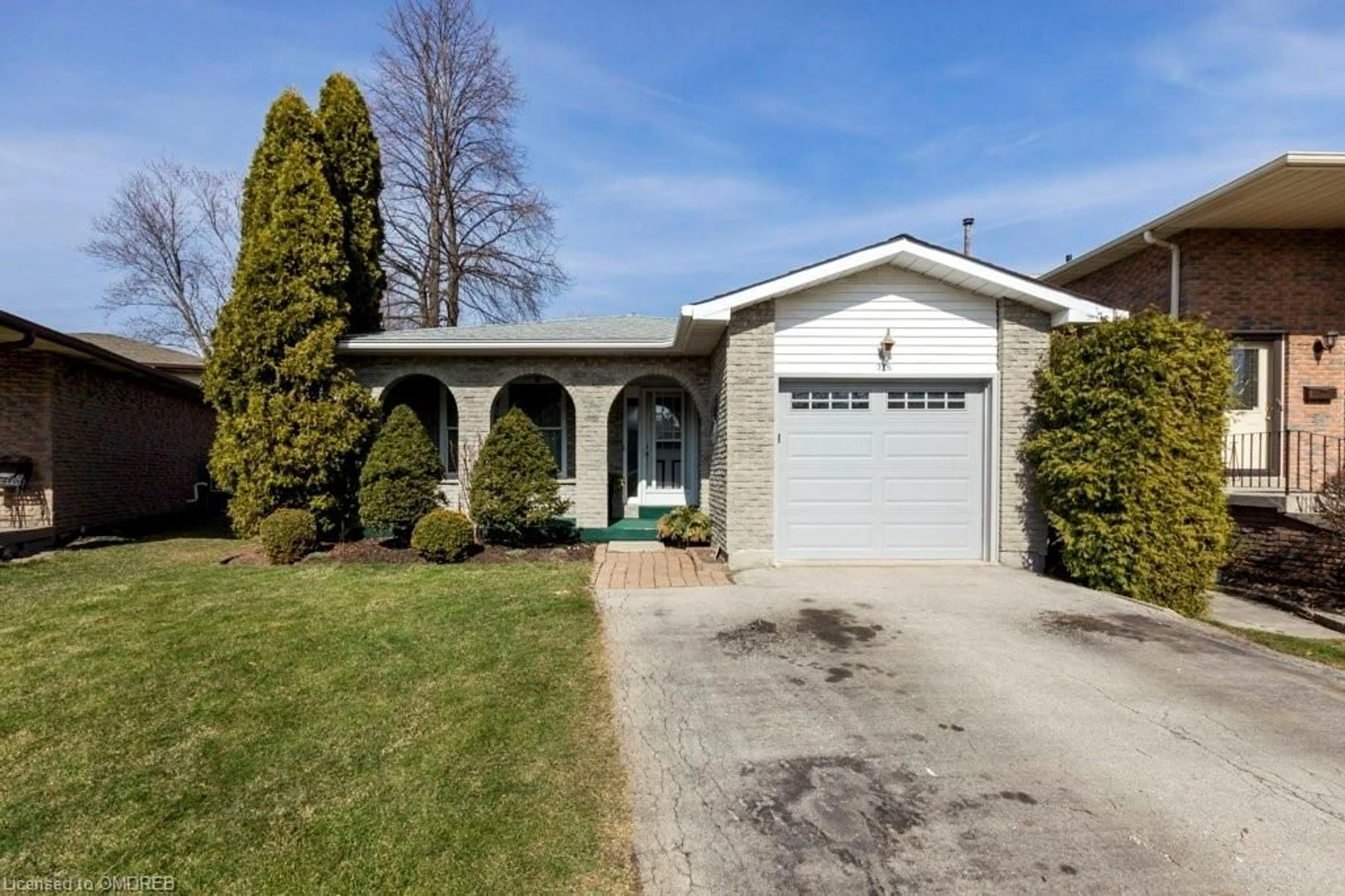 Frontside or backside of a home for 715 Coulson Ave, Milton Ontario L9T 4J3