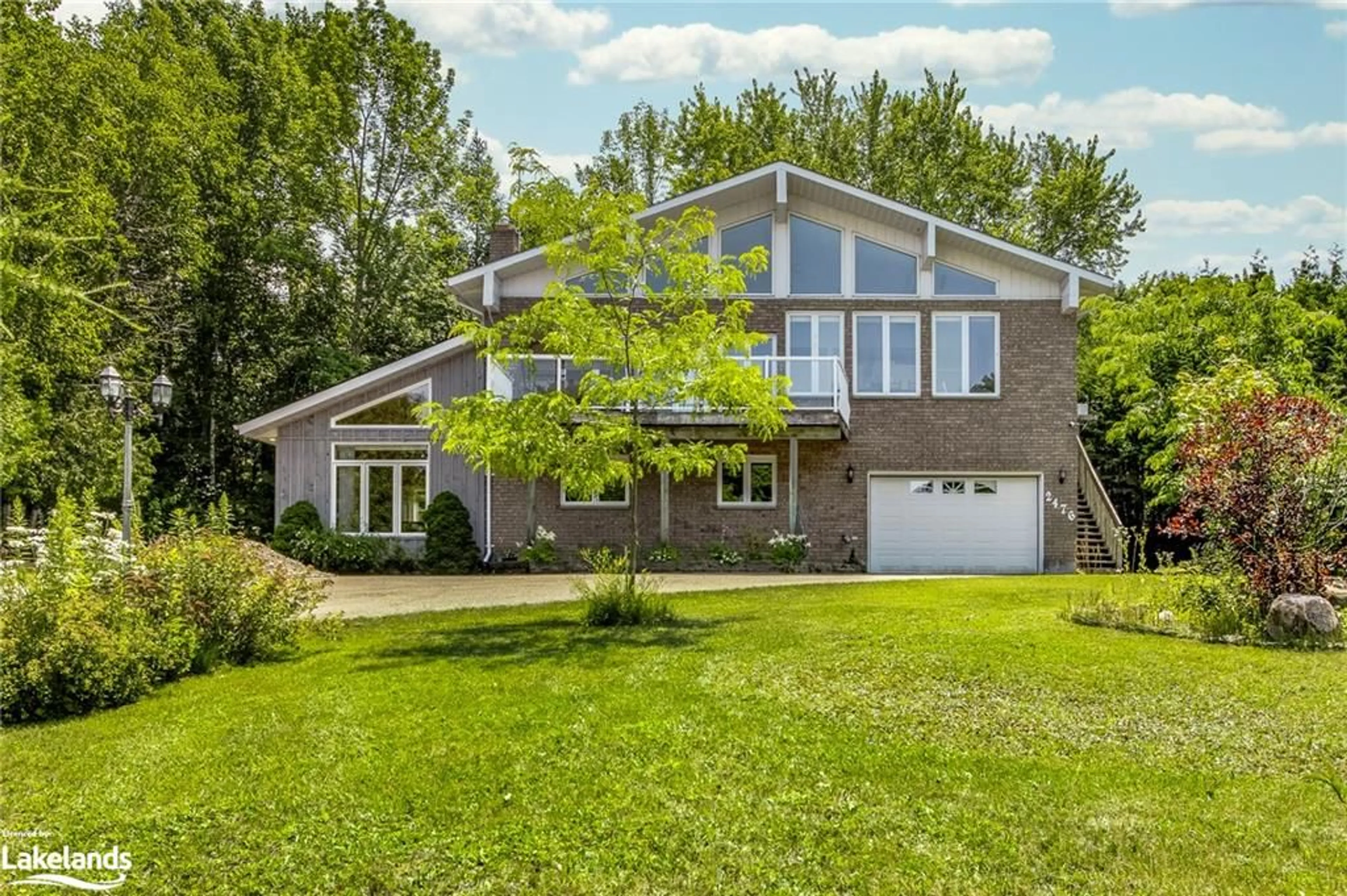 Frontside or backside of a home for 2476 Champlain Rd, Tiny Twp Ontario L9M 0C3