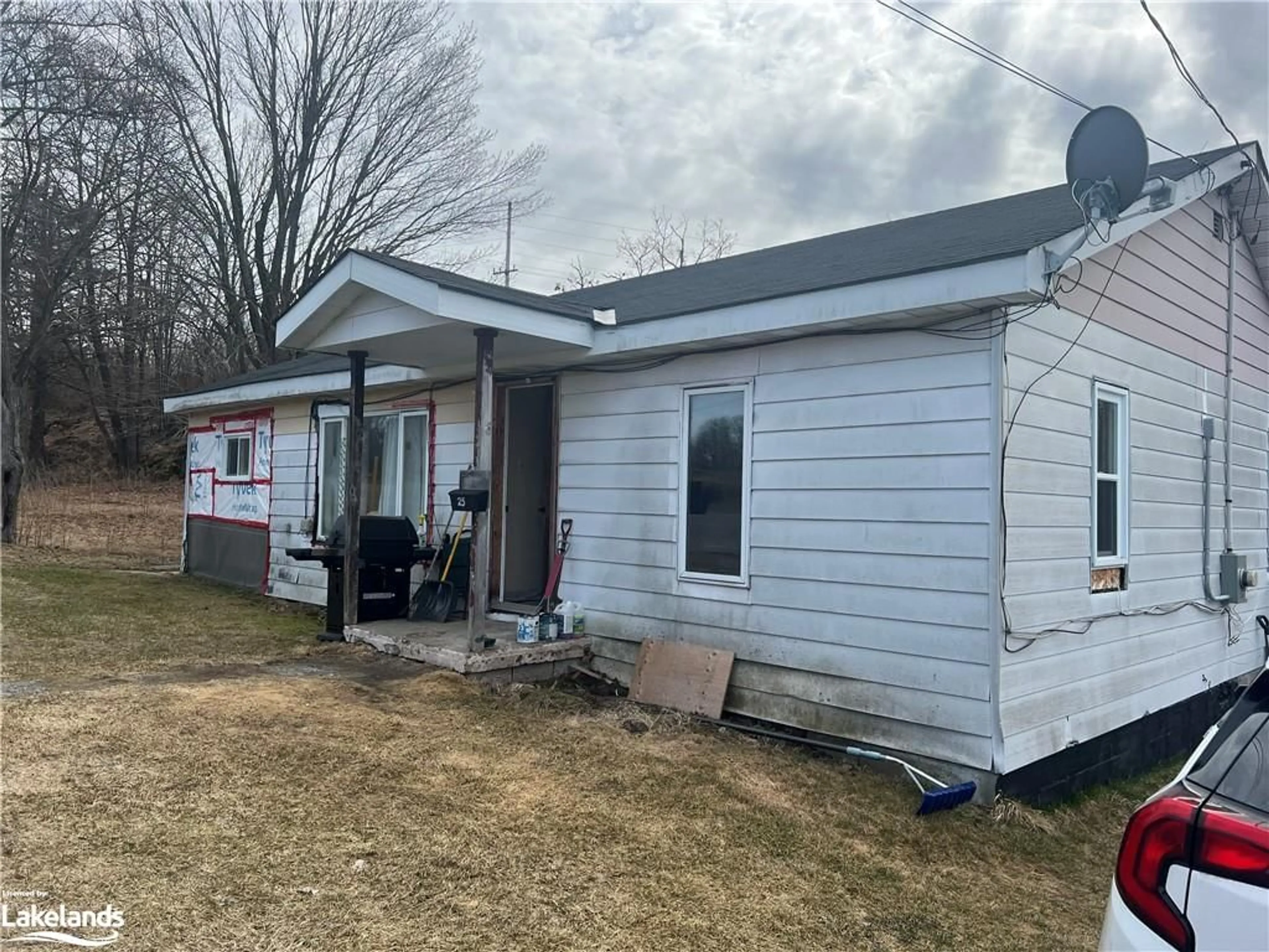Frontside or backside of a home for 25 Macfarlane St, Parry Sound Ontario P2A 2N3