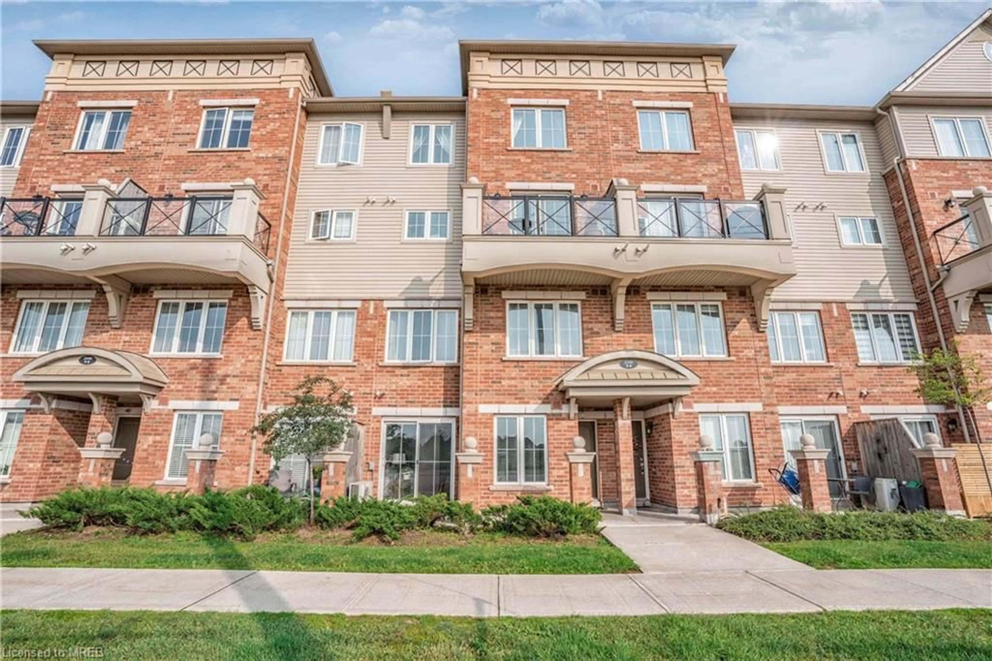 A pic from exterior of the house or condo for 2500 Post Rd #4, Oakville Ontario L6H 0K1