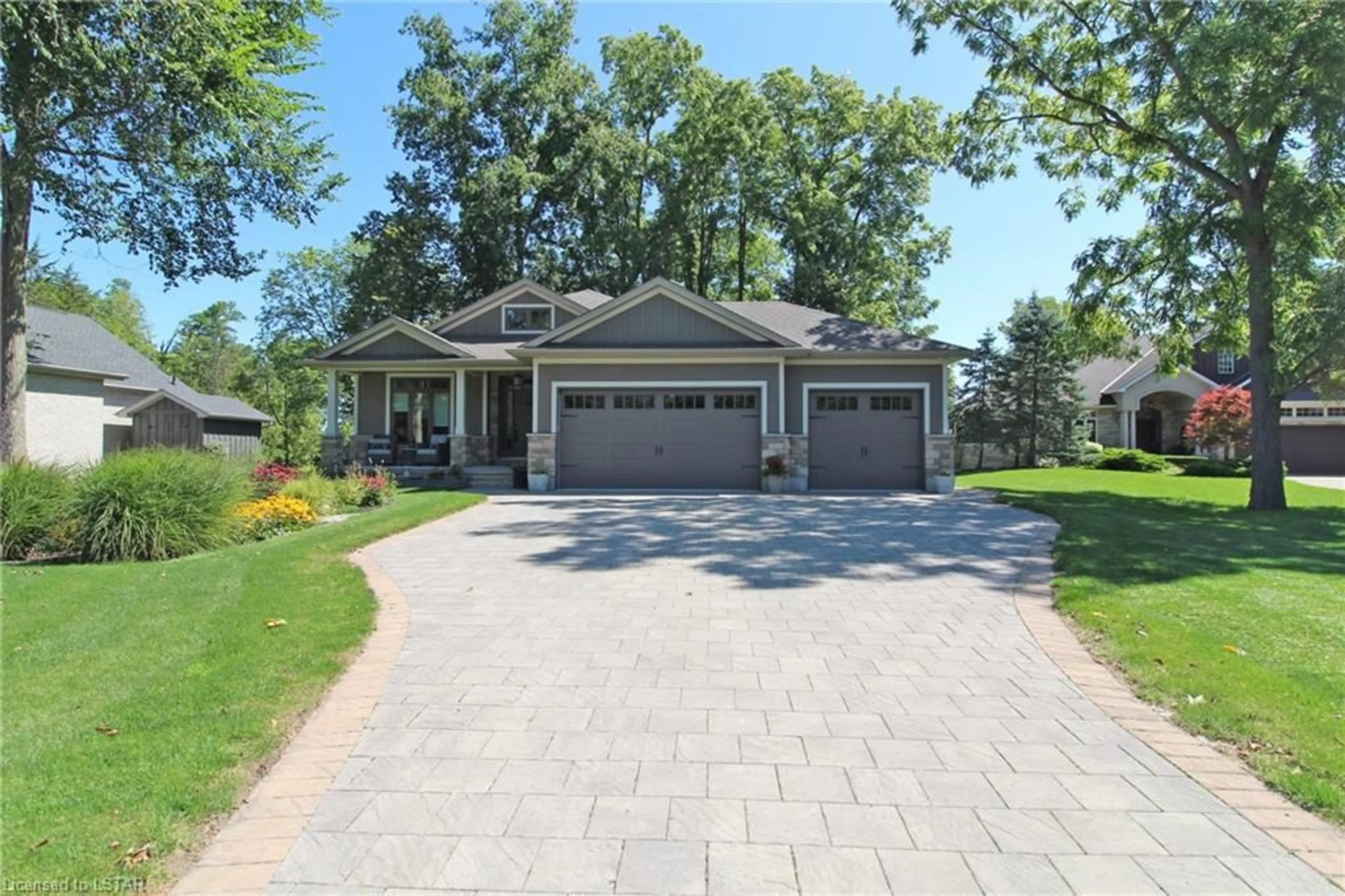 Home with brick exterior material for 10138 Merrywood Dr, Grand Bend Ontario N0M 1T0