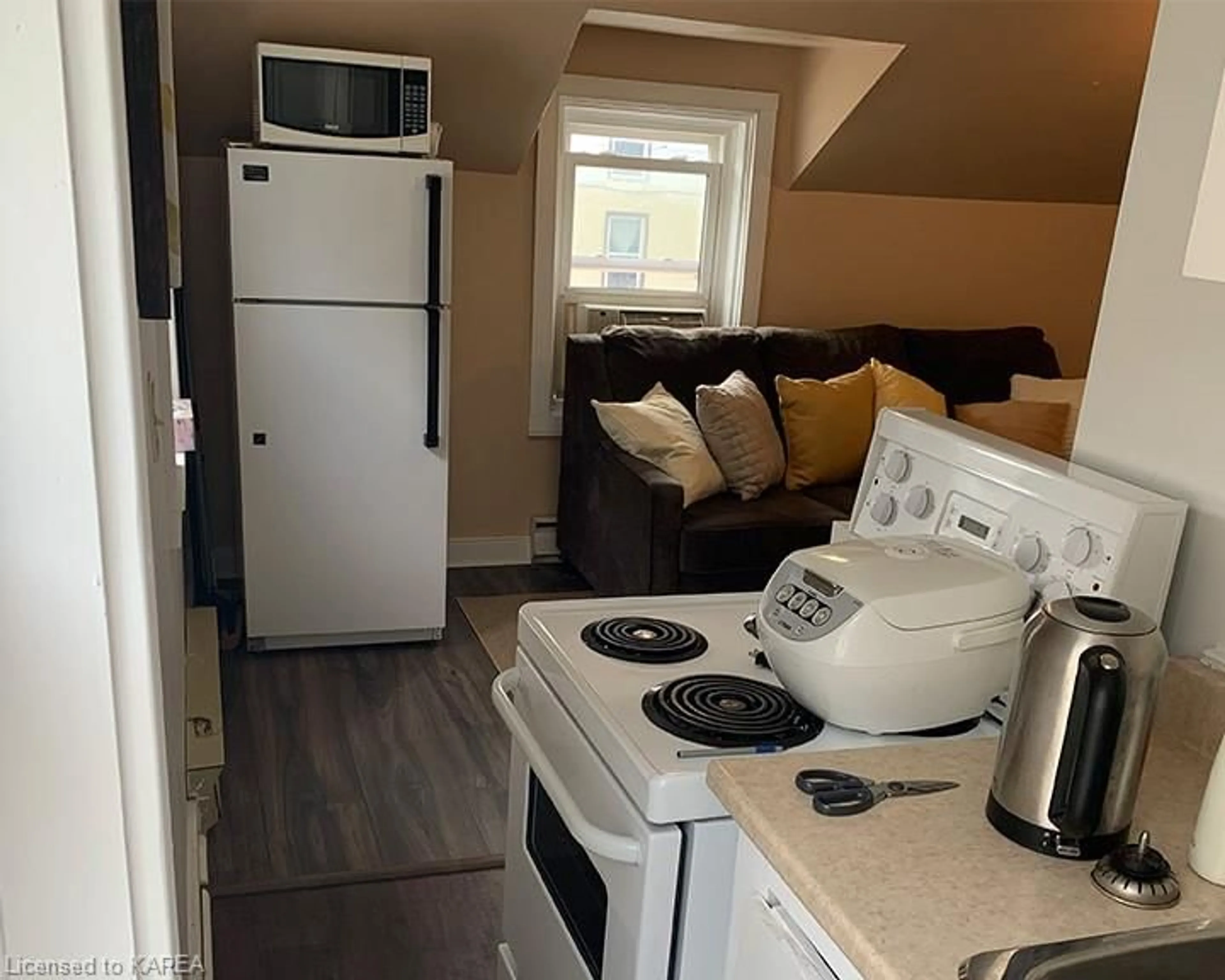 Kitchen with laundary machines for 359 Division St, Kingston Ontario K7K 4A4