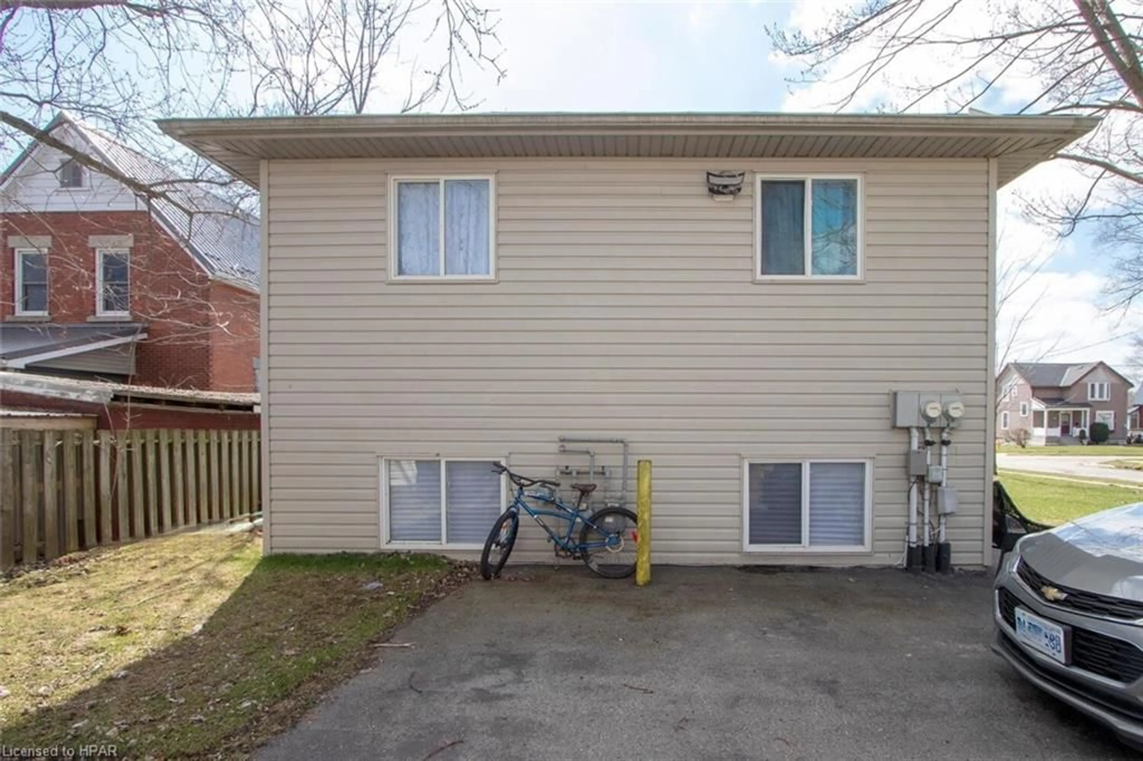 A pic from exterior of the house or condo, the fenced backyard for 17 Laurier St, Stratford Ontario N5A 4M2