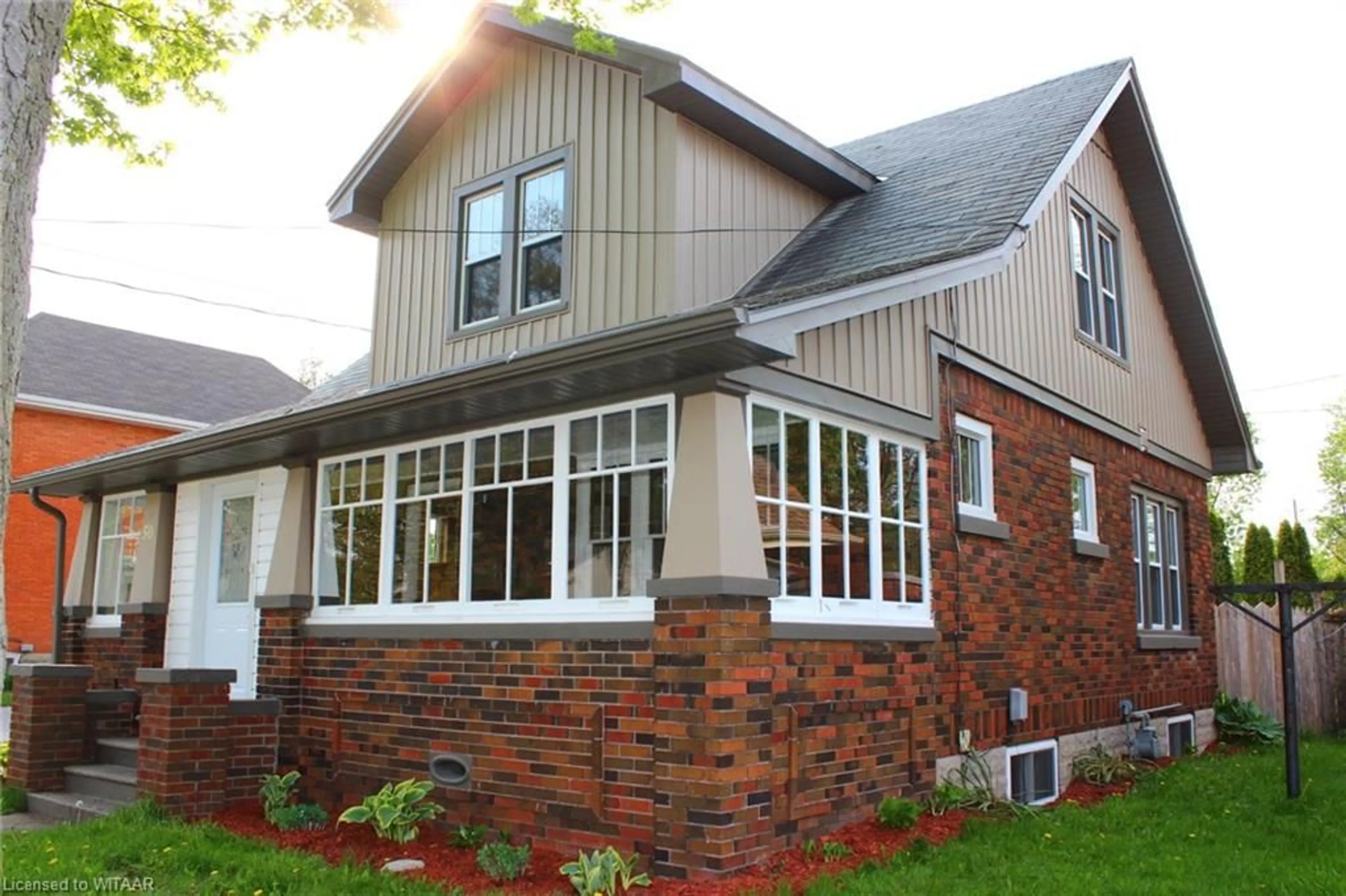 Home with brick exterior material for 50 London St, Tillsonburg Ontario N4G 2L5