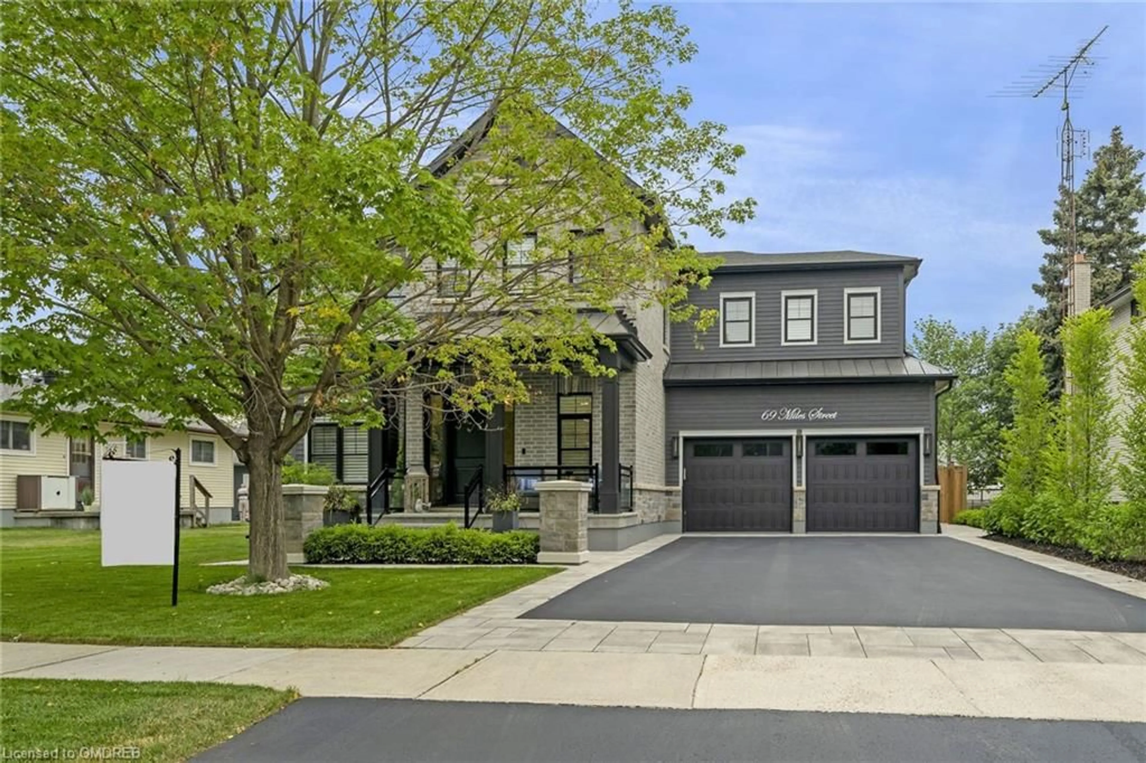 Frontside or backside of a home for 69 Miles St, Milton Ontario L9T 1E7