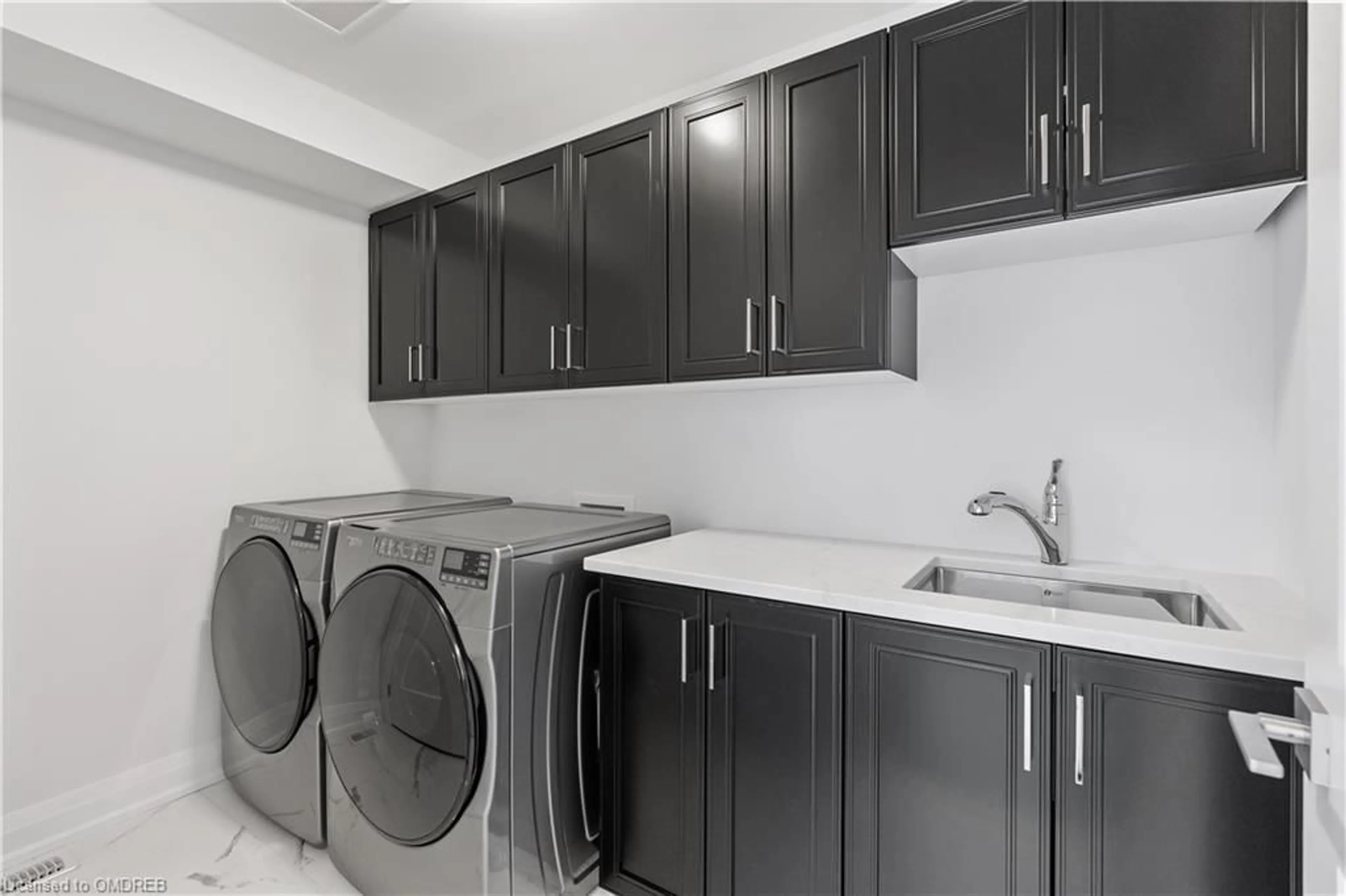 Laundry room for 675 Victoria Rd #9, Guelph Ontario N1E 0S9