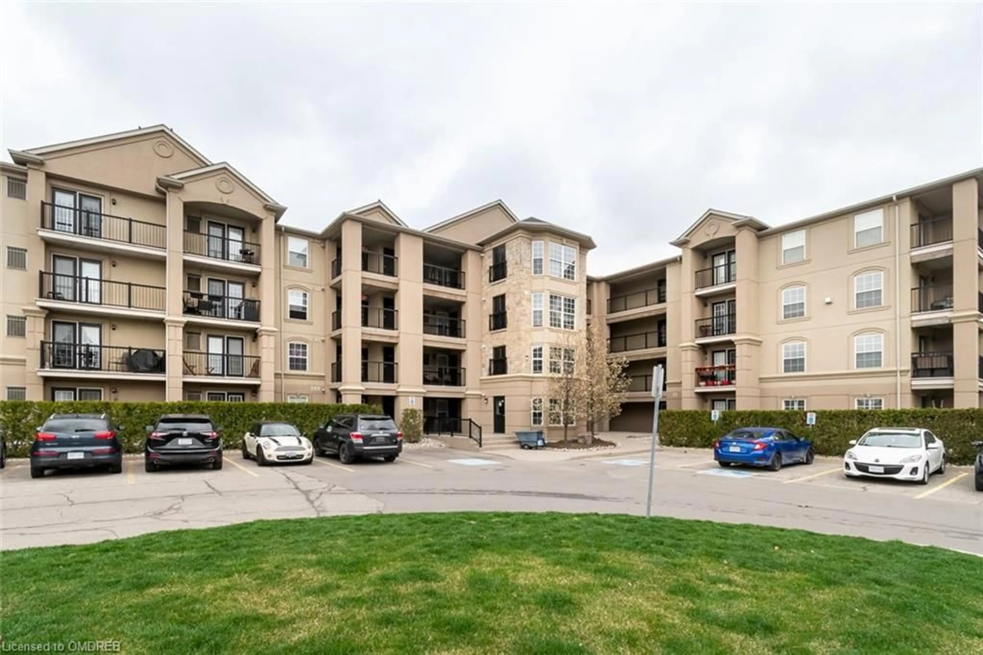 A pic from exterior of the house or condo for 1483 Maple Ave #406, Milton Ontario L9T 0B6