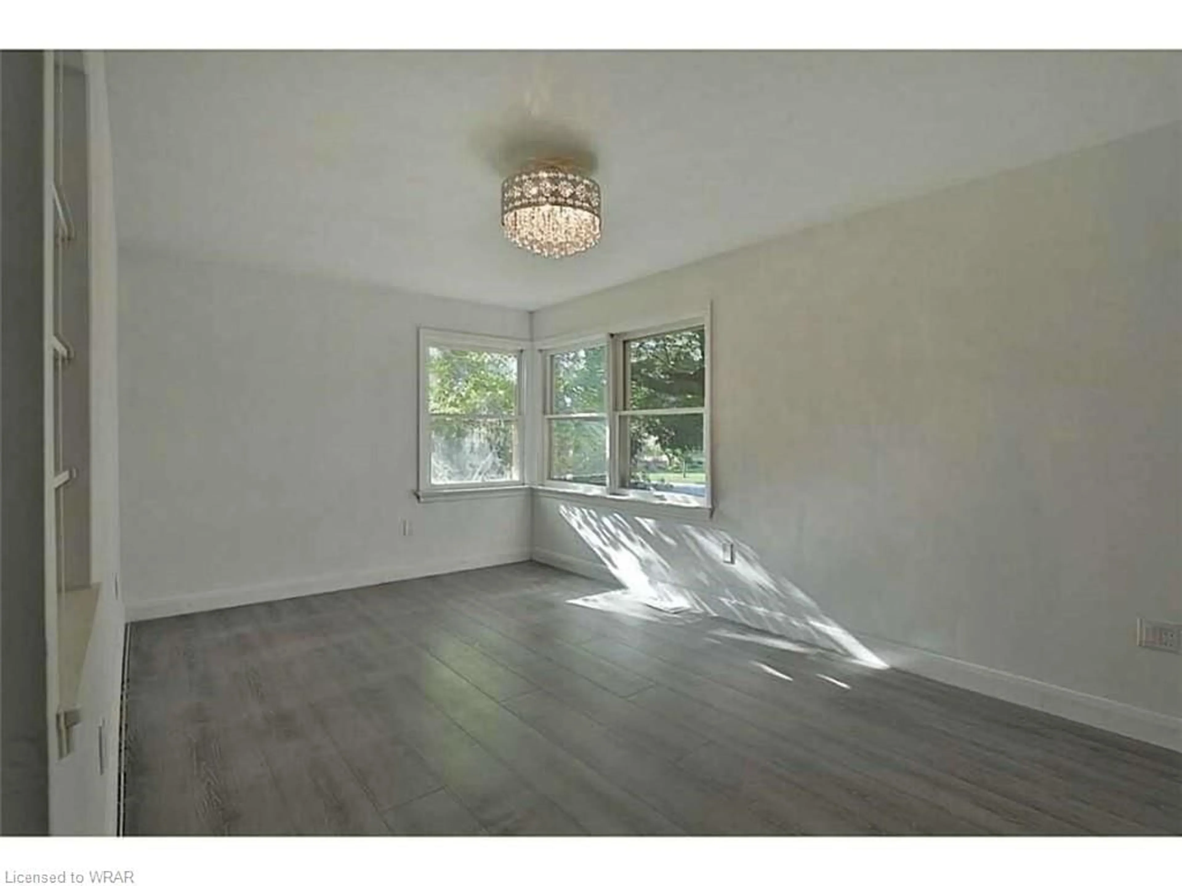 A pic of a room, wood floors for 247 Belvenia Rd, Burlington Ontario L7L 2G5