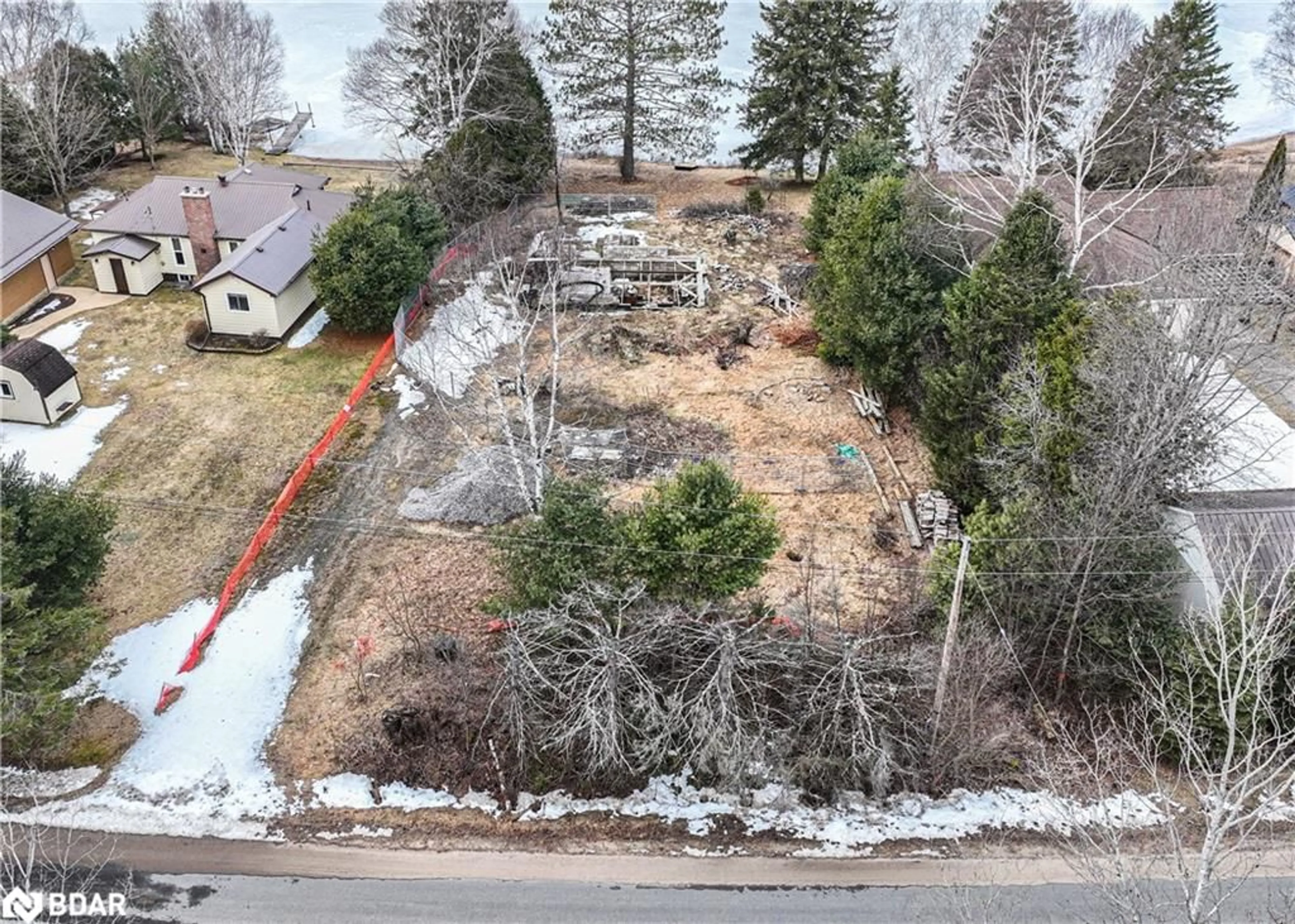 Frontside or backside of a home, the fenced backyard for 158 Lakeview Ave, Kearney Ontario P0A 1M0