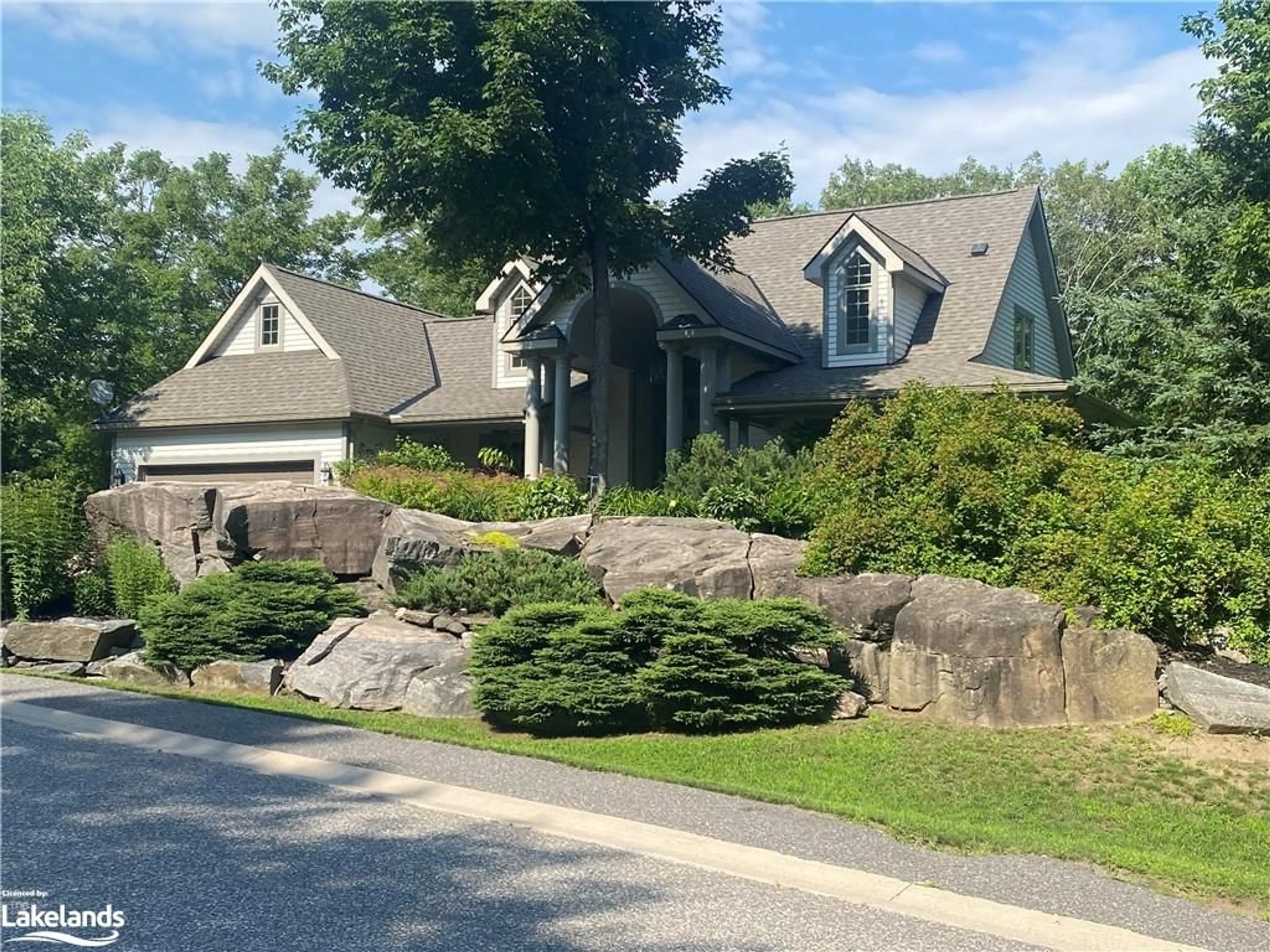 Frontside or backside of a home for 48 Estate Dr, Port Carling Ontario P0B 1J0