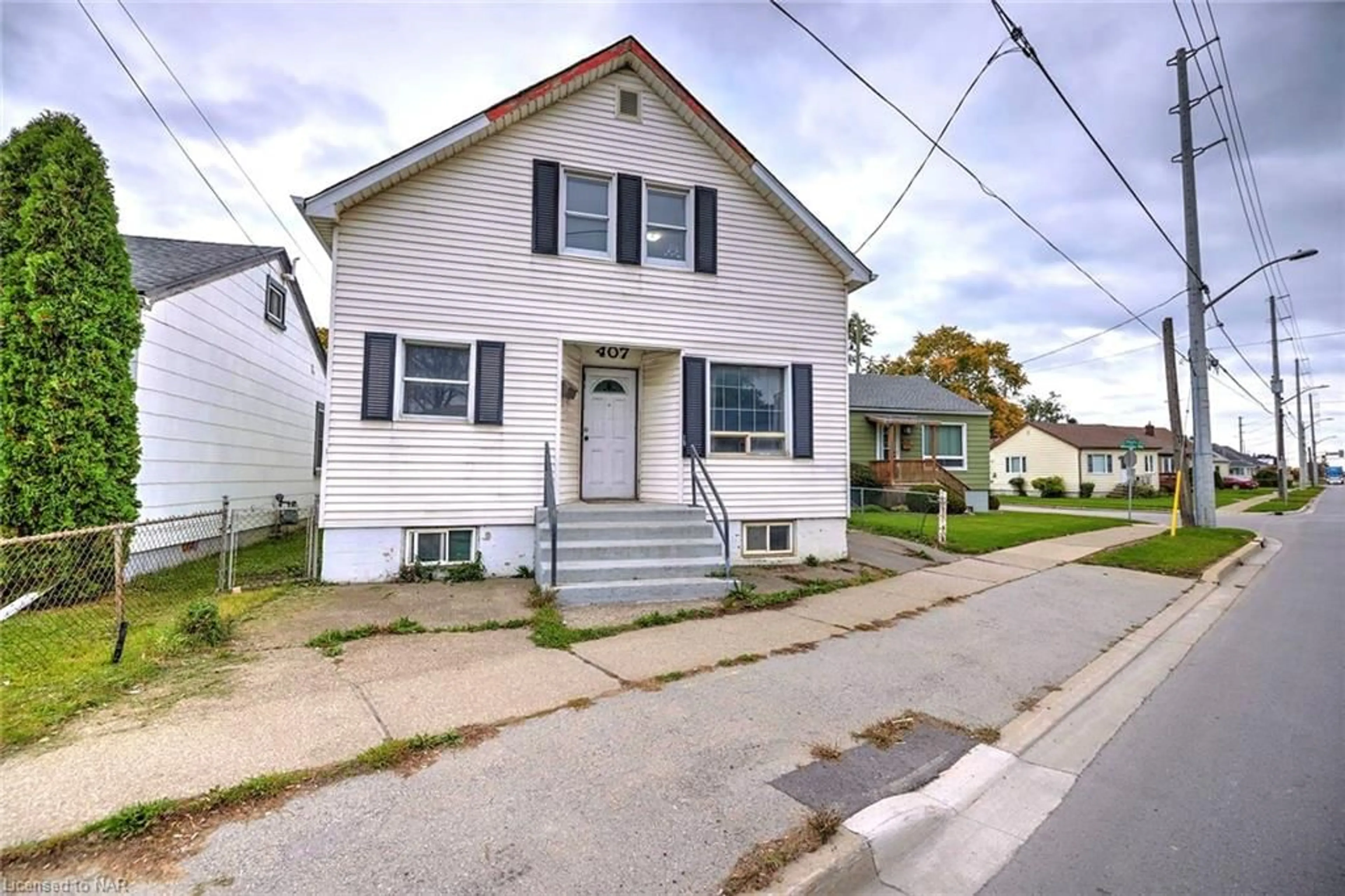 Frontside or backside of a home for 407 Welland Ave, St. Catharines Ontario L2M 5T9