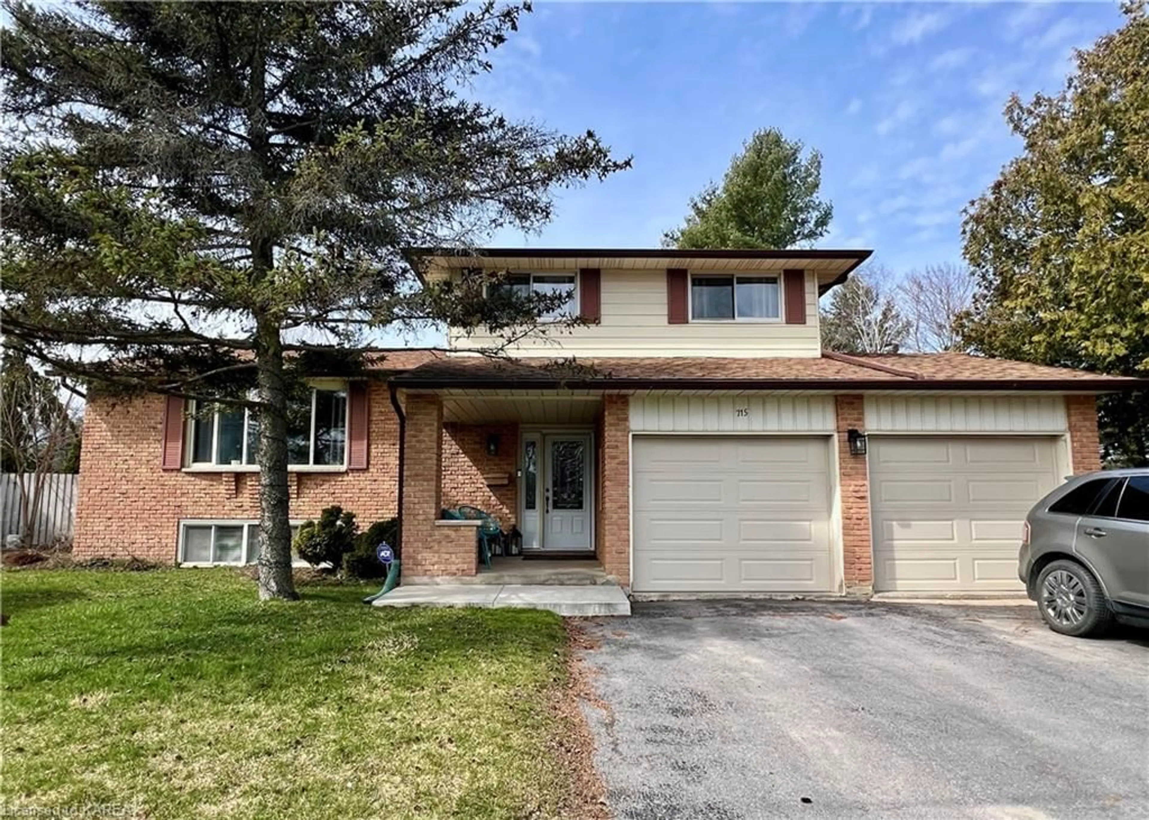 Home with brick exterior material for 715 Collins Bay Rd, Kingston Ontario K7M 5H1