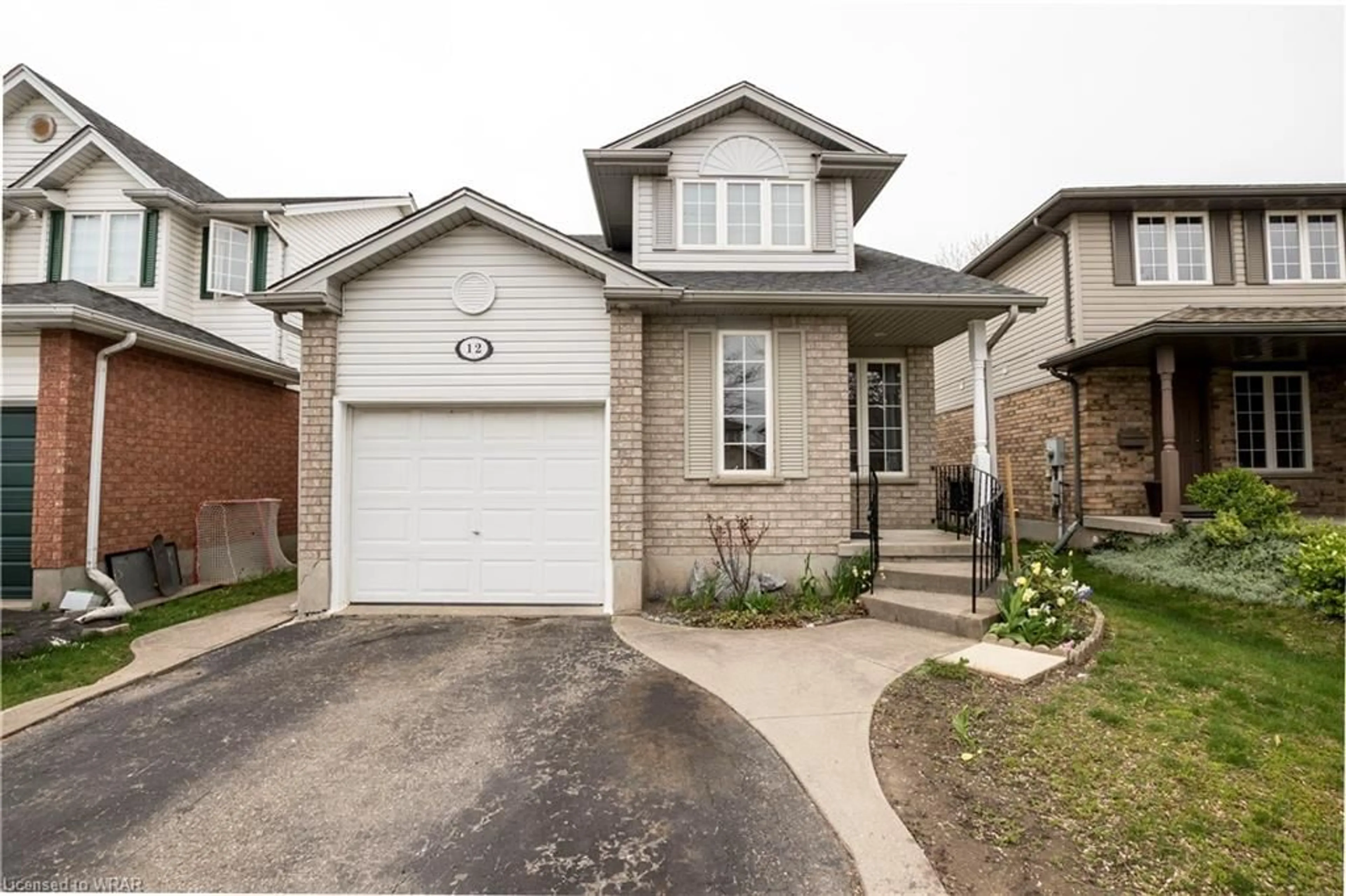 Frontside or backside of a home for 12 Whittaker Cres, Cambridge Ontario N1T 1H8