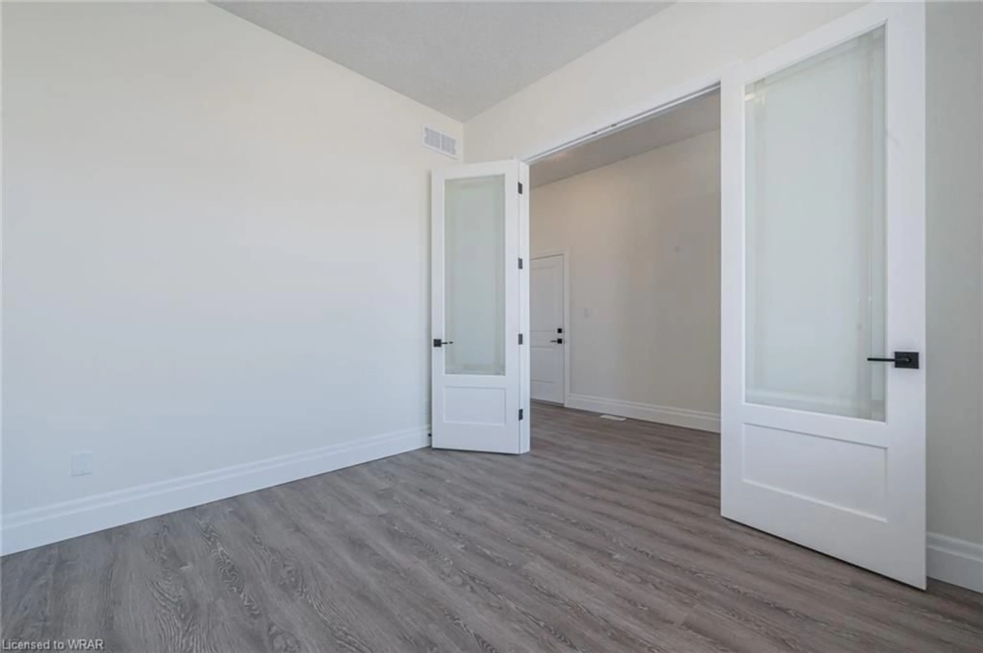 A pic of a room, wood floors for 255 Ladyslipper Dr, Waterloo Ontario N2V 0C3