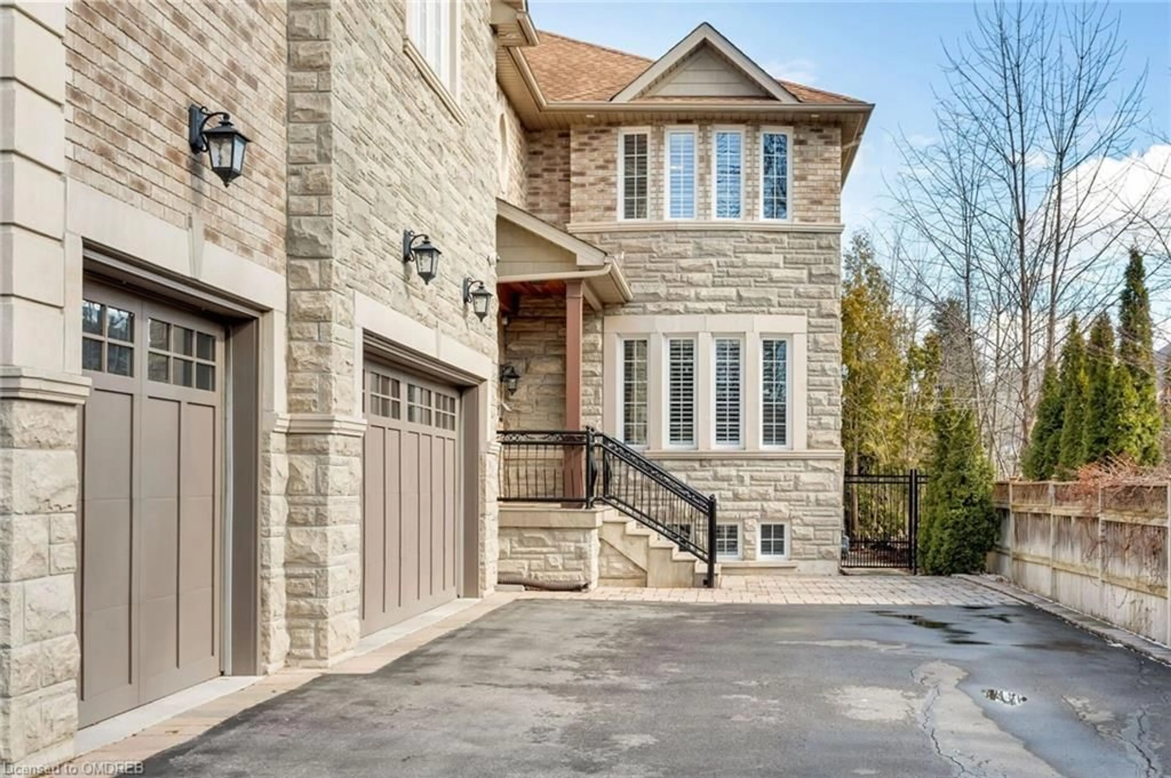 Home with brick exterior material for 2431 Old Carriage Rd, Mississauga Ontario L5C 1Y6