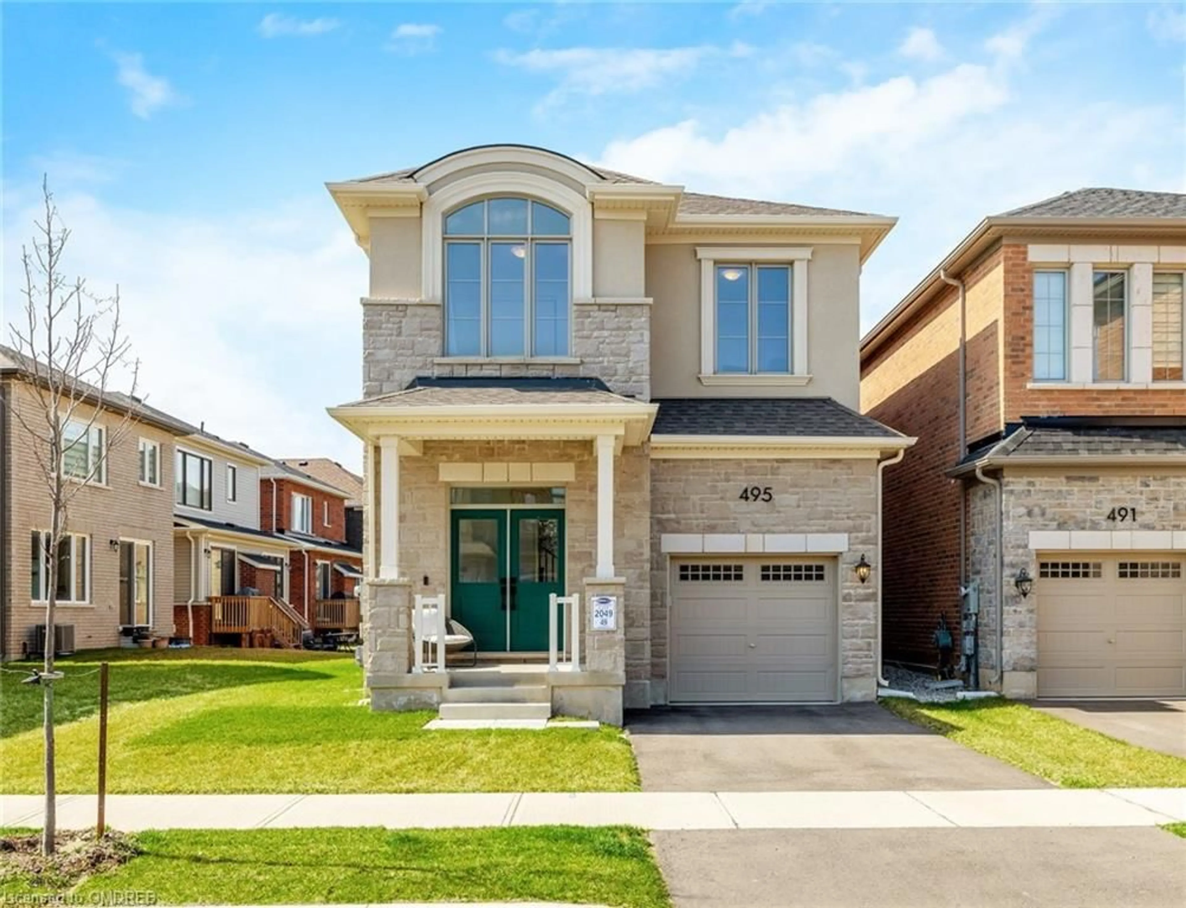 Home with brick exterior material for 495 Violet Gate, Milton Ontario L9E 1X6
