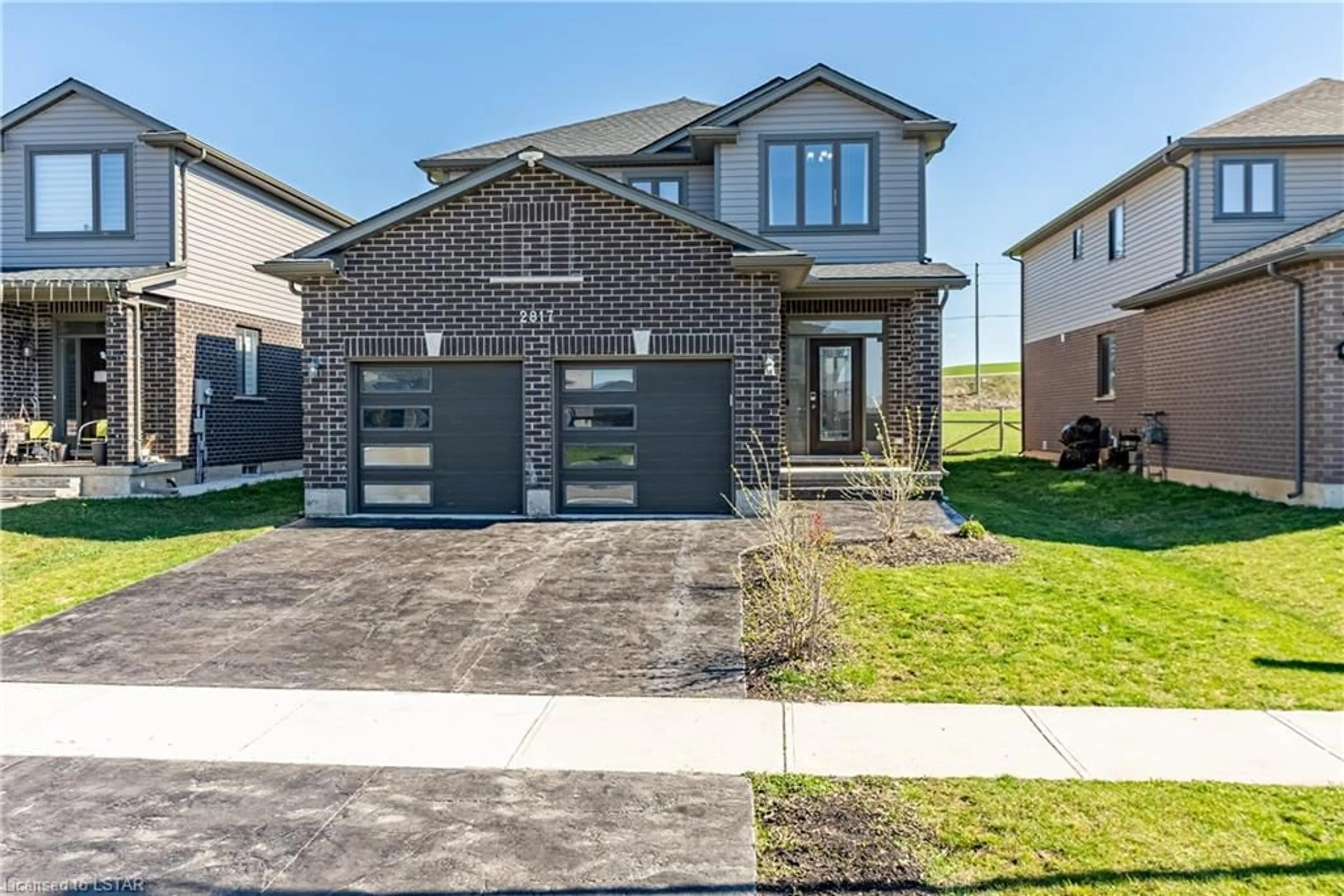 Frontside or backside of a home for 2817 Doyle Dr, London Ontario N6M 0G7