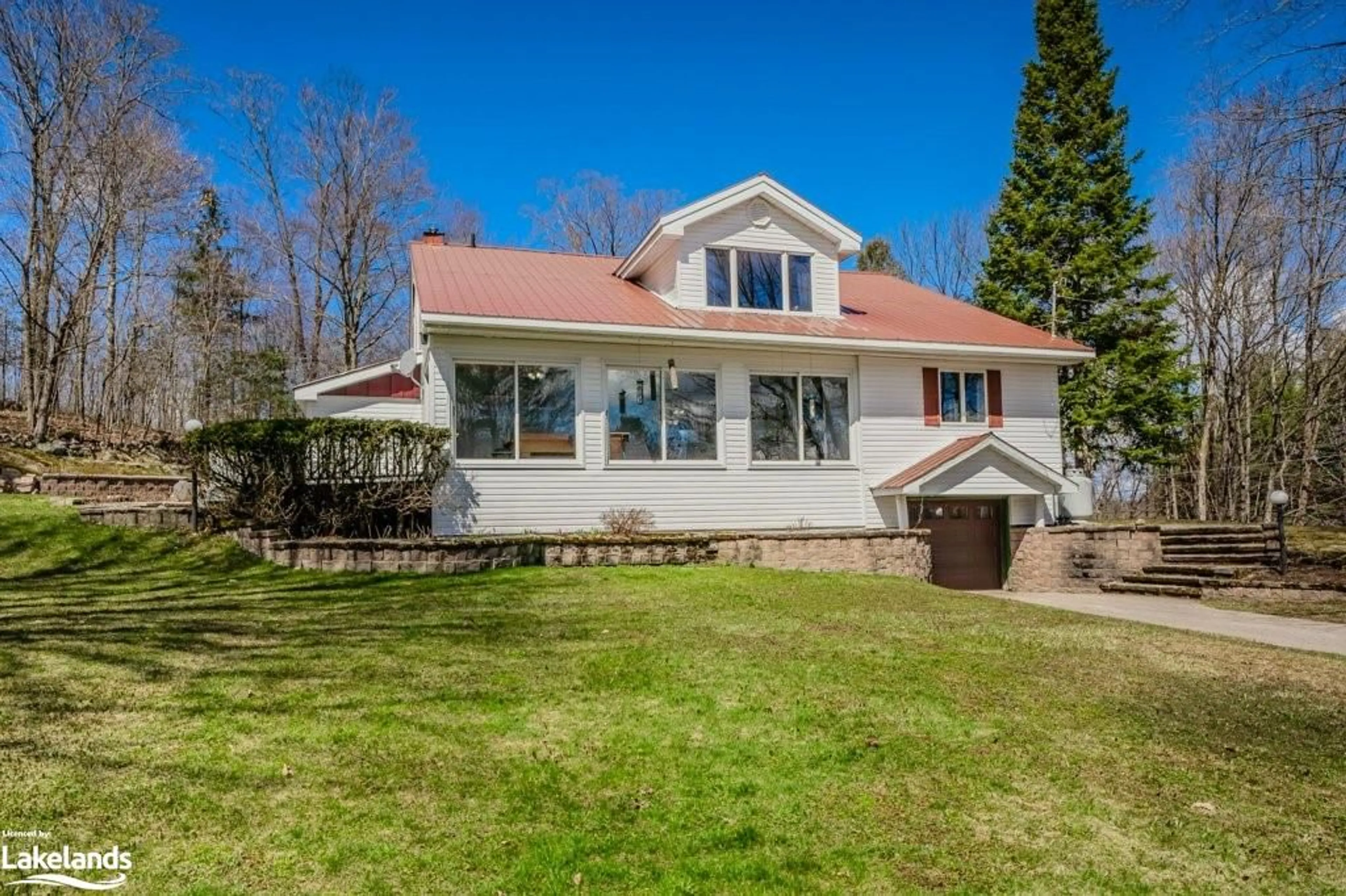 Frontside or backside of a home for 53 Todholm Dr, Port Carling Ontario P0B 1J0